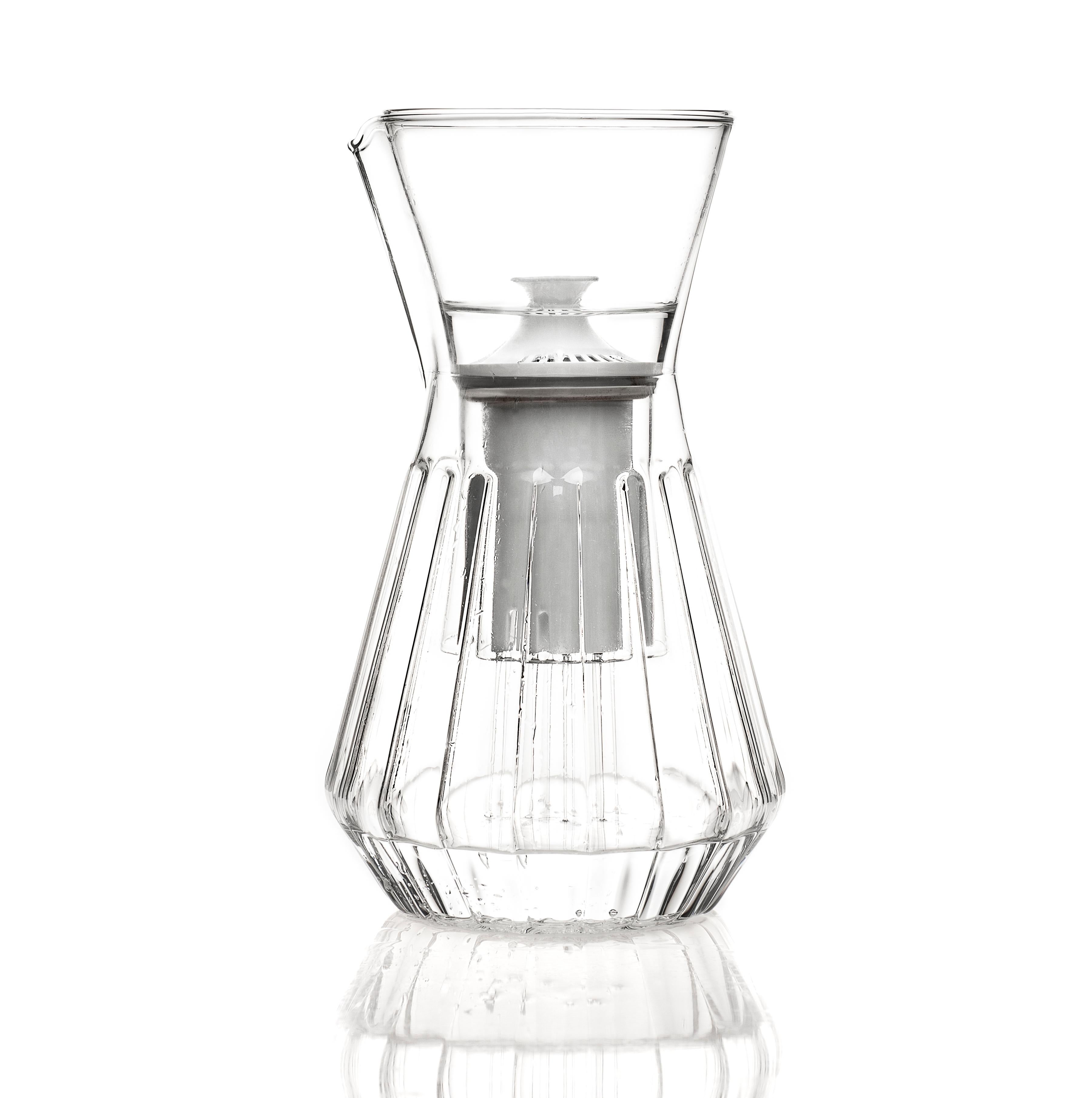 Inspired by the mundane plastic water filter pitcher, the Talise transforms the ubiquitous plastic vessel into an elegant glass carafe, increasing its durability and improving its functionality. When used with the glass funnel, the standard water
