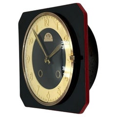 FFR French Mid Century Mechanical Wall Clock in Black Formica, 1950s FFR French Mid Century Mechanical Wall Clock in Black Formica, 1950s