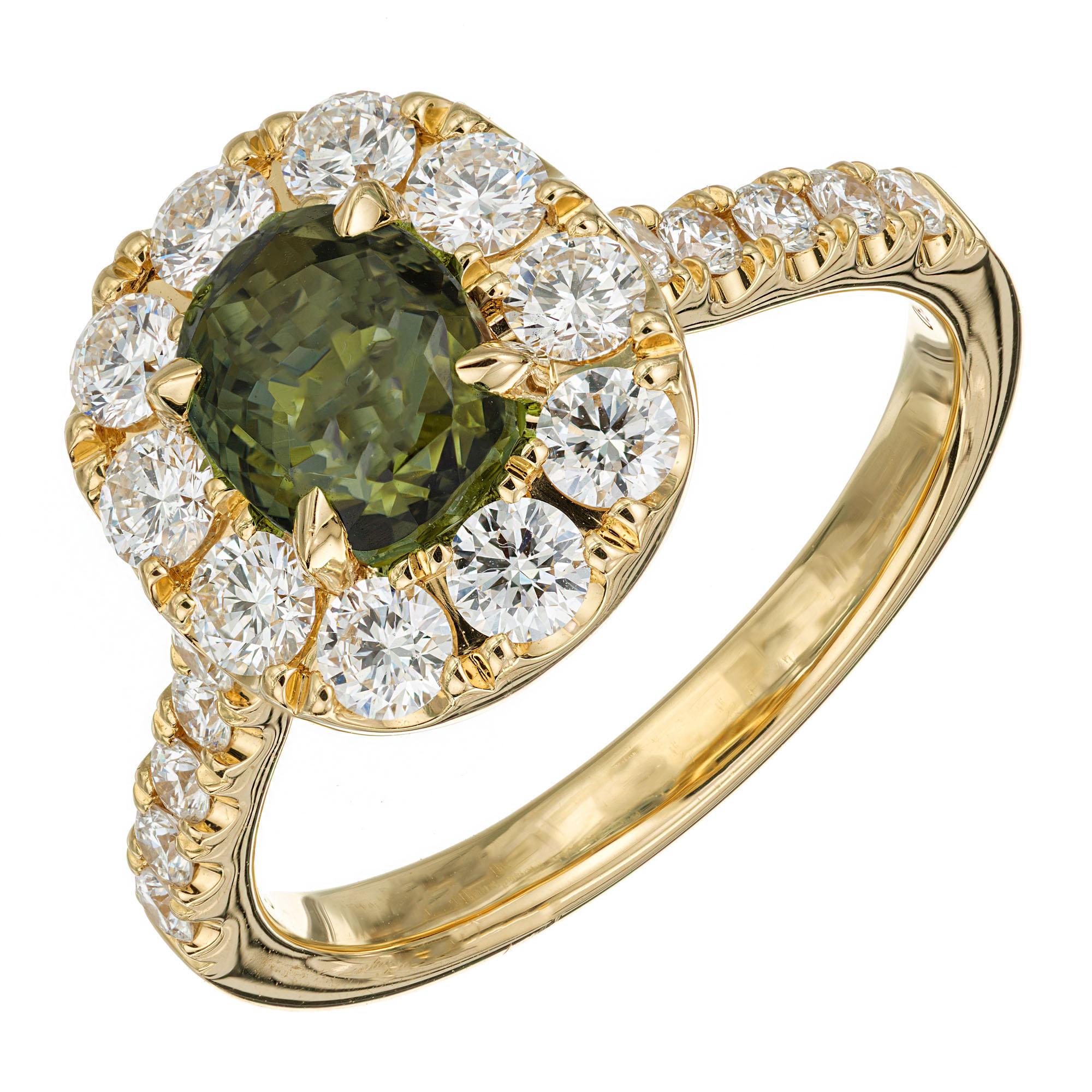 Alexandrite chrysoberyl and diamond engagement ring. FGL Natural untreated French gem lab certified green to reddish change of color 2.15 carat cushion cut alexandrite in 18k yellow gold setting with a halo of 20 round cut diamonds and diamonds