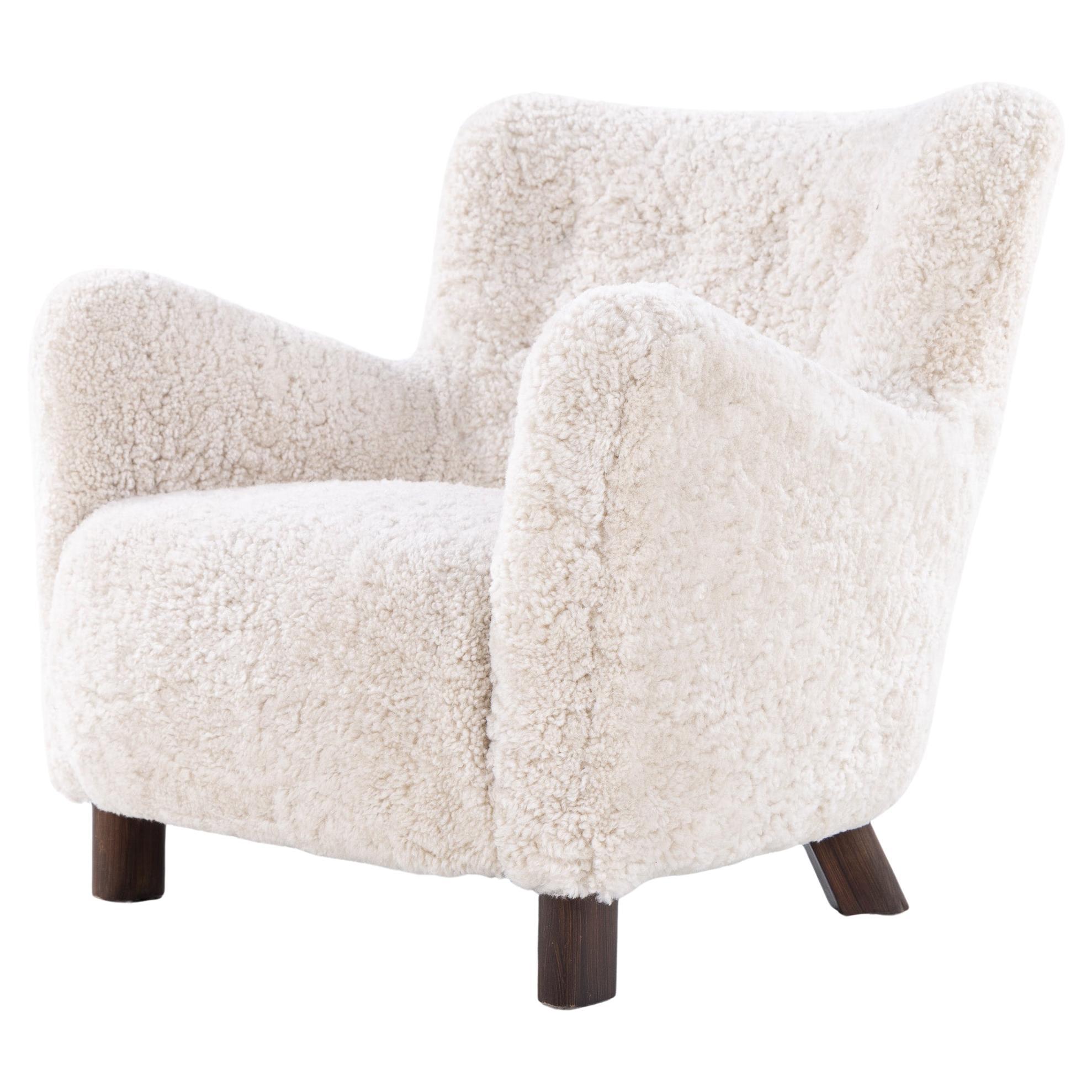 FH 1669 - Easy chair in lambskin by Fritz Hansen, 1930's