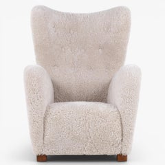 FH 1672 - Wingback chair in lambskin by Fritz Hansen