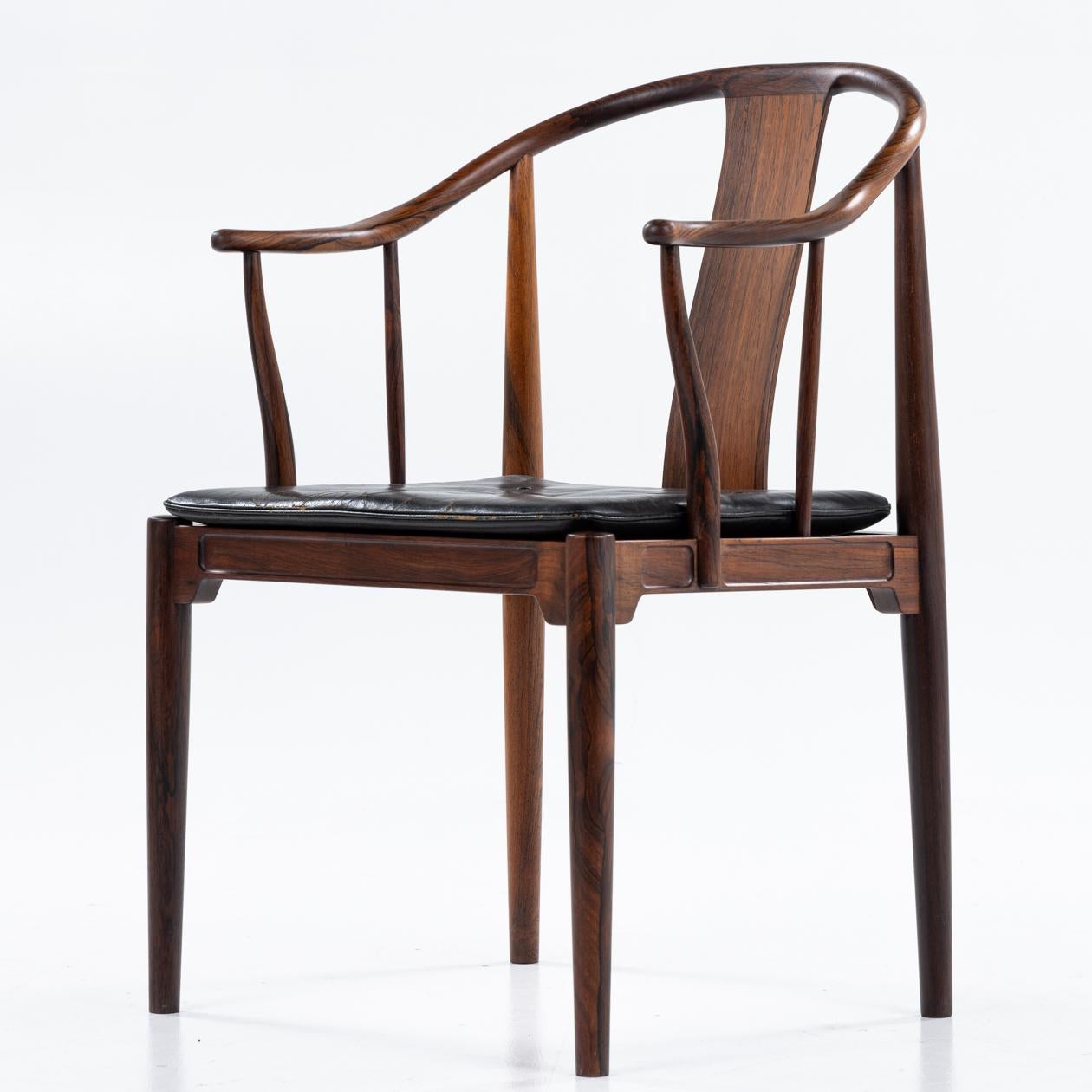 FH 4283 - China chair in Brazilian rosewood with black patinated leather seat.