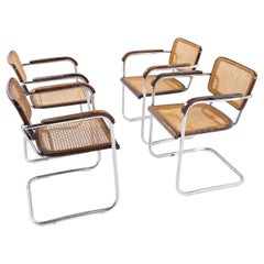 FH 6107 - Set of four armchairs in steel by Fritz Hansen.