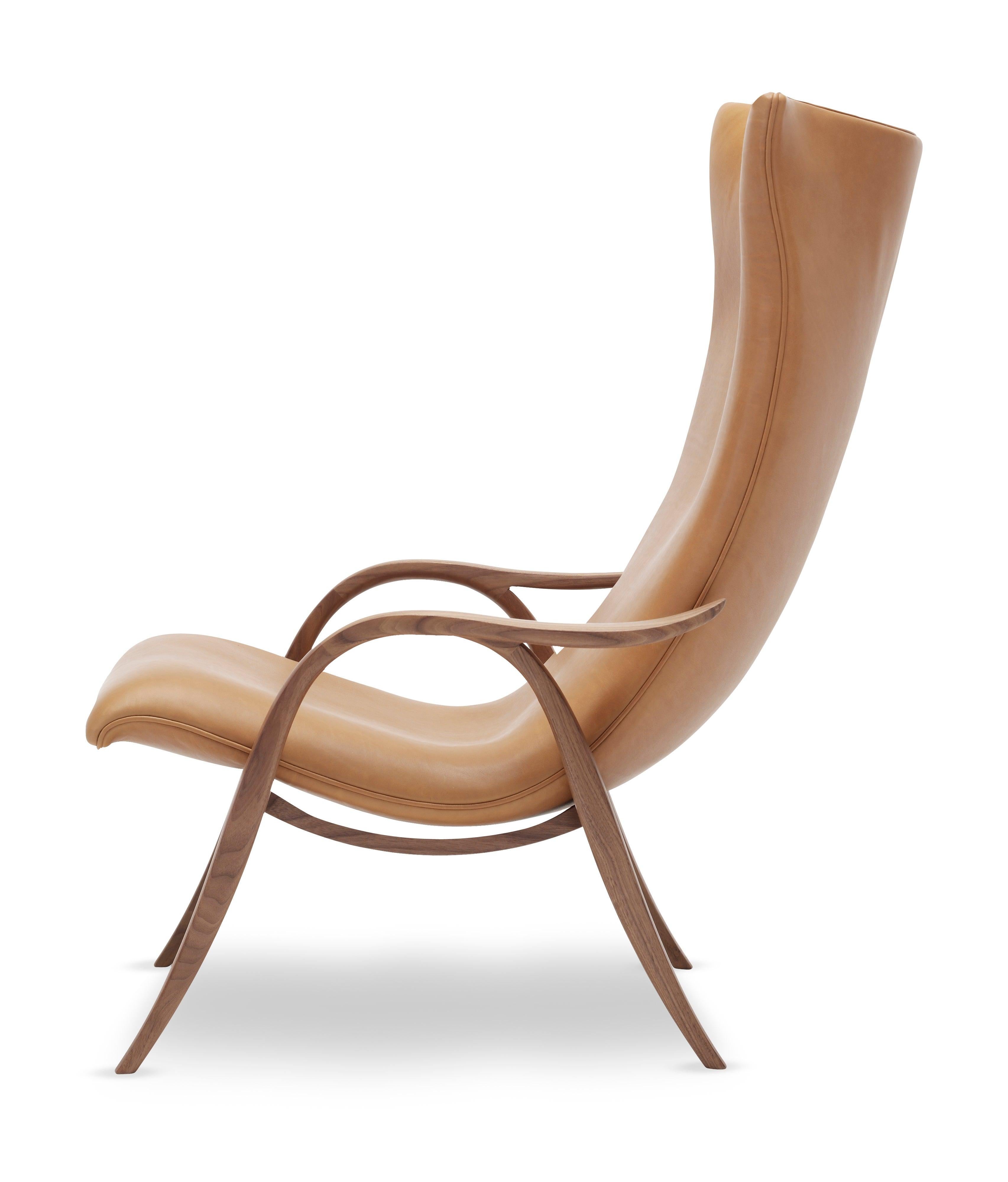 The FH429 Signature chair was designed by Frits Henningsen, a cabinetmaker who held his profession to very high standards. Henningsen always manufactured his own designs and often began by creating a small model â€“ in this case, using modeling clay