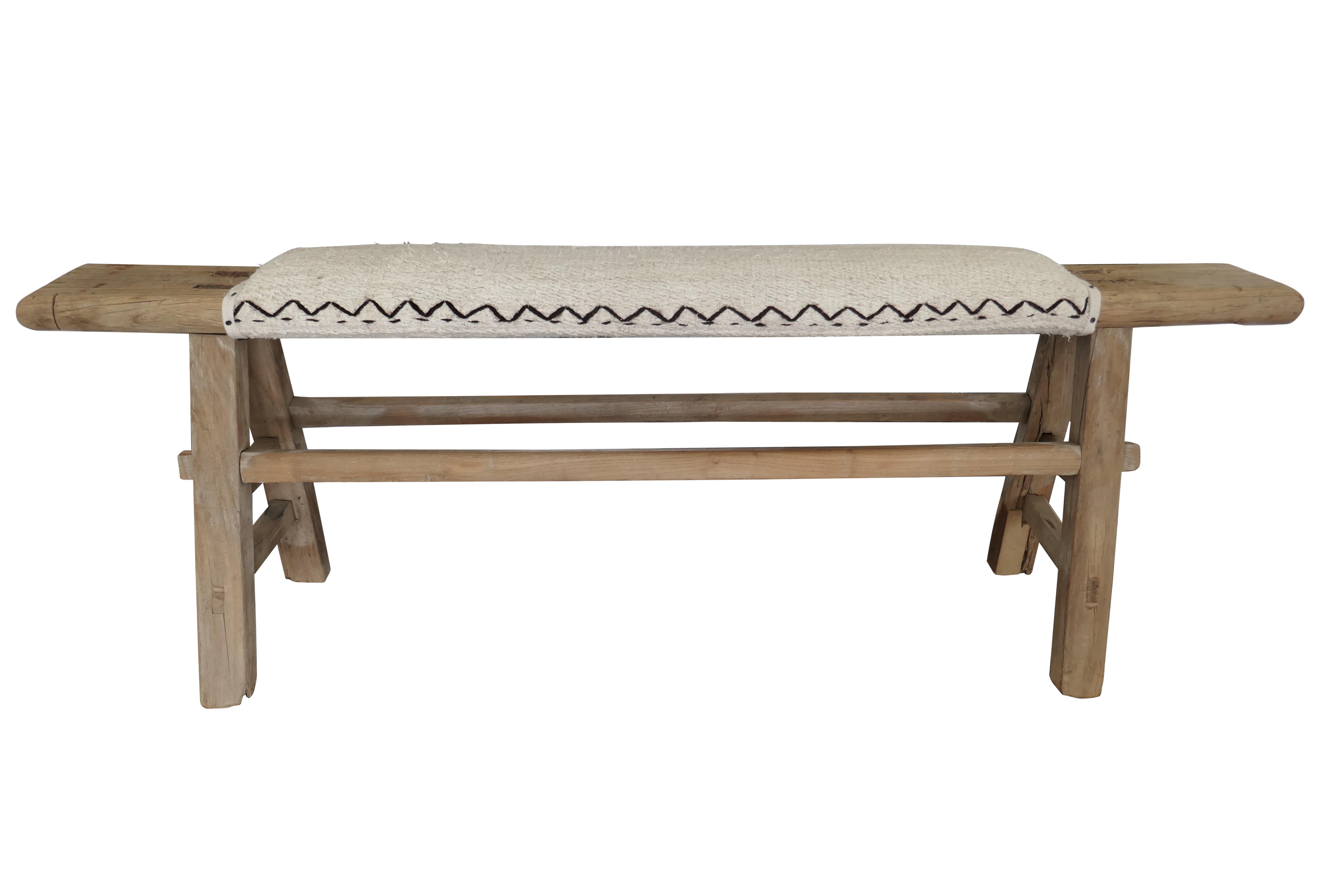 One-of-a-Kind!
Our authentic antique Asian Shandong bench, primitively hand-built of solid heavy-weight raw elmwood. Constructed with early mortise & tenon joinery, showing much desirable history characteristics. Cushioned top, perfectly