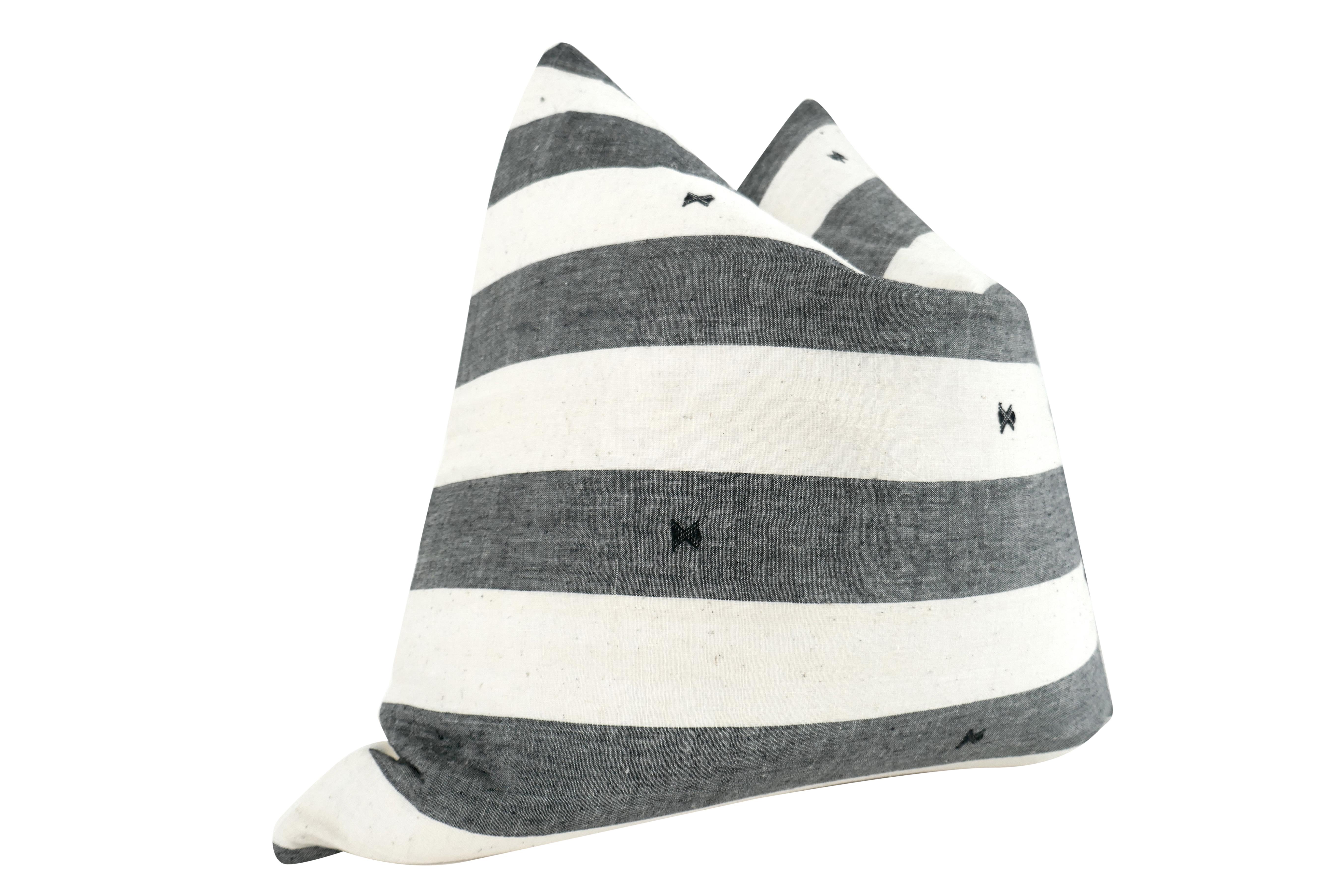 FI custom large pillow in beautiful global intricately hand-spun pure silk and wool in ultra soft hand. Variegated black and natural tone woven stripes and subtle motif. Complemented with our luxe premium white pure linen on reverse side. Ultra