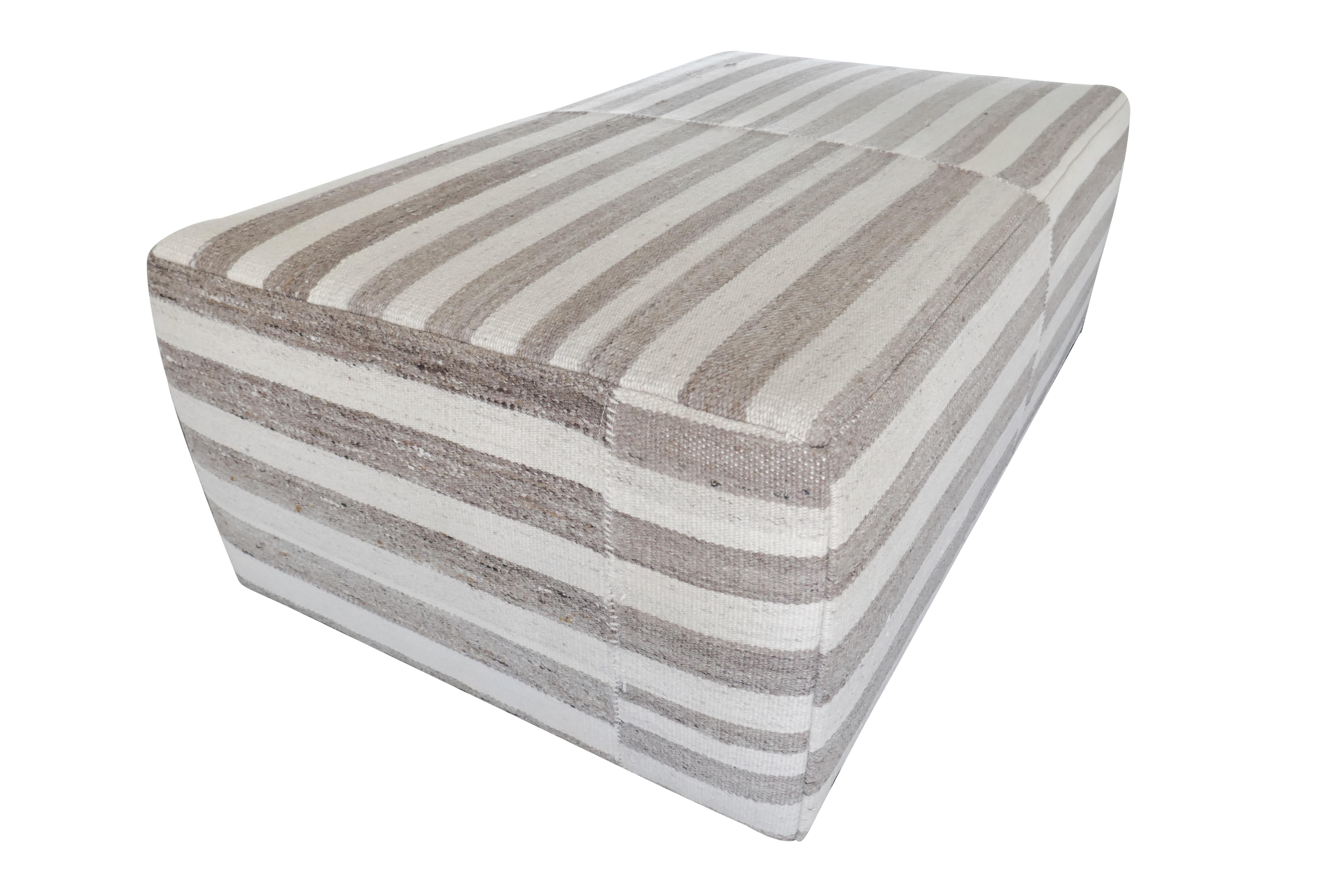 One-of-a-Kind!
FI custom large cocktail style ottoman. Perfectly upholstered in outstanding authentic vintage hand-woven heavy textural Berber Kilim organic raw wool in fabulous muted taupes and natural tones. Featuring the original hand