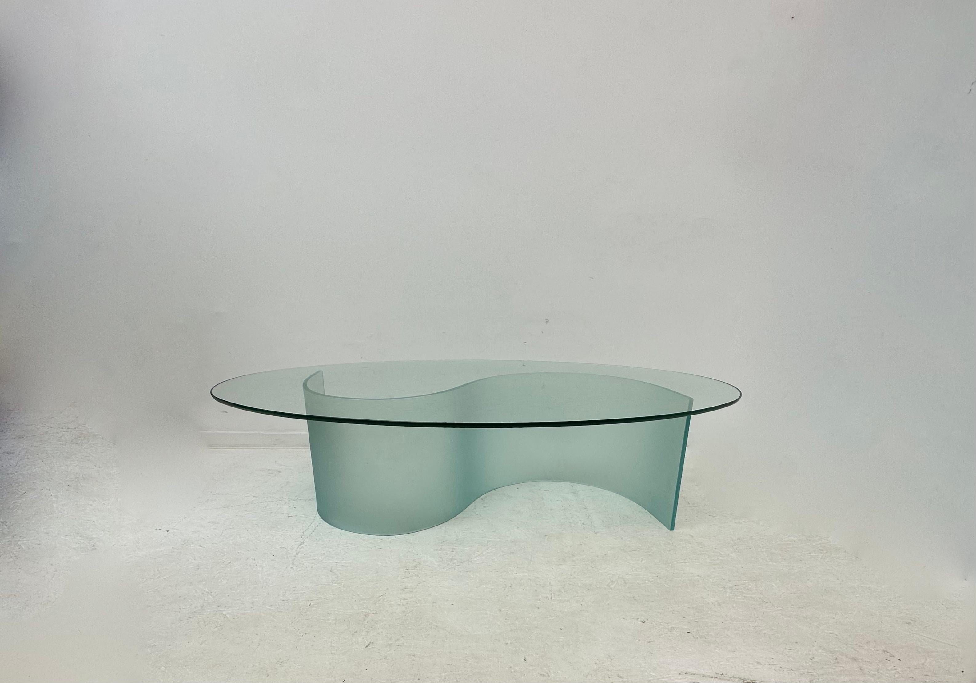 Fiam coffee table Mid-Century design , 1970’s

Dimensions: 139cm W, 80cm D, 36,5cm H
Period: 1970’s
Material: Glass
Condition: Has scratches on top part.