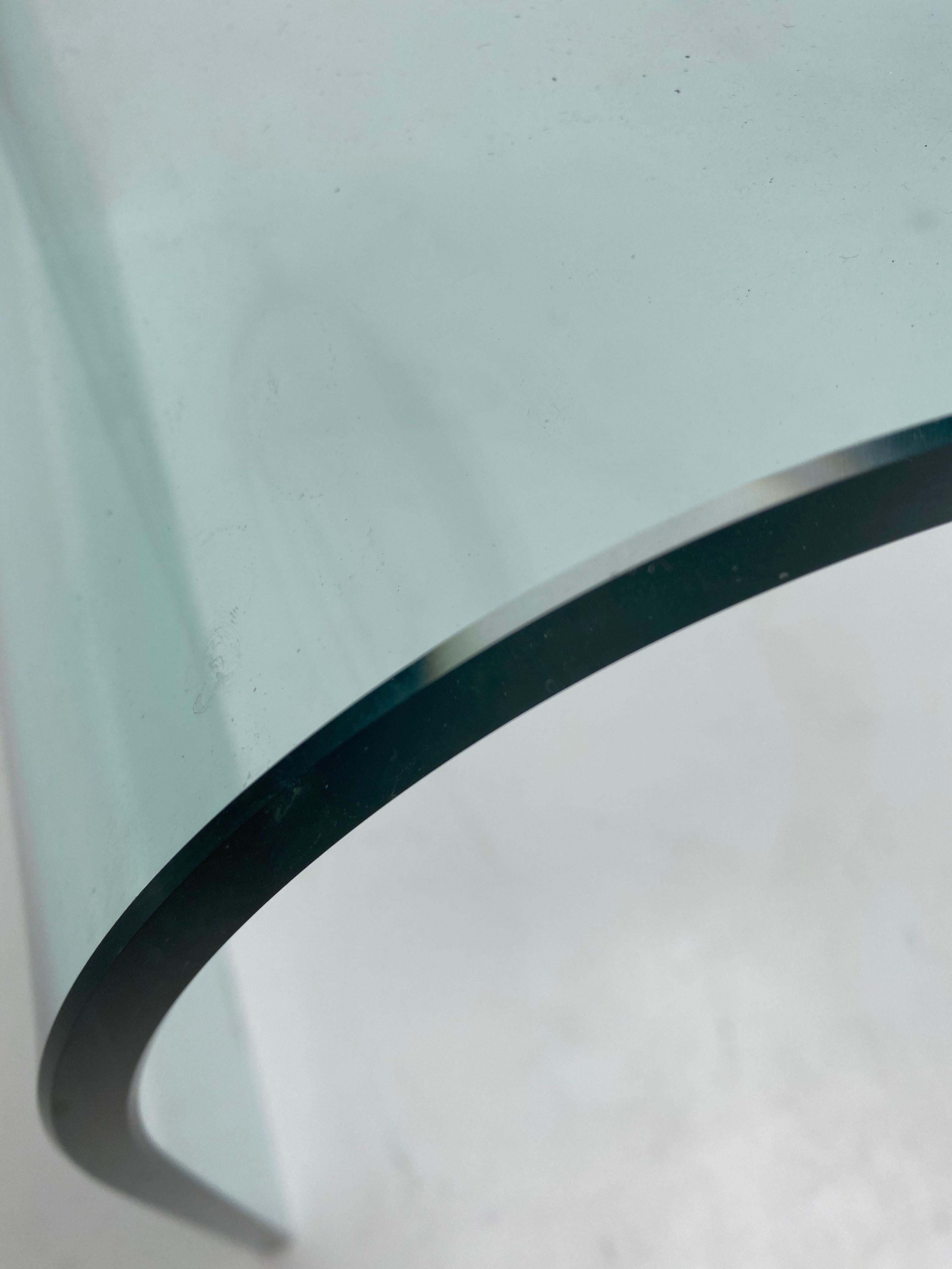 Italian Postmodernist coffee table by Angelo Cortesi produced by Fiam in the 1980's

The table is in pristine vintage condition and has no chips, a few minor user wear scratching marks to the surface of the glass

It is made off 12mm/0,47inch