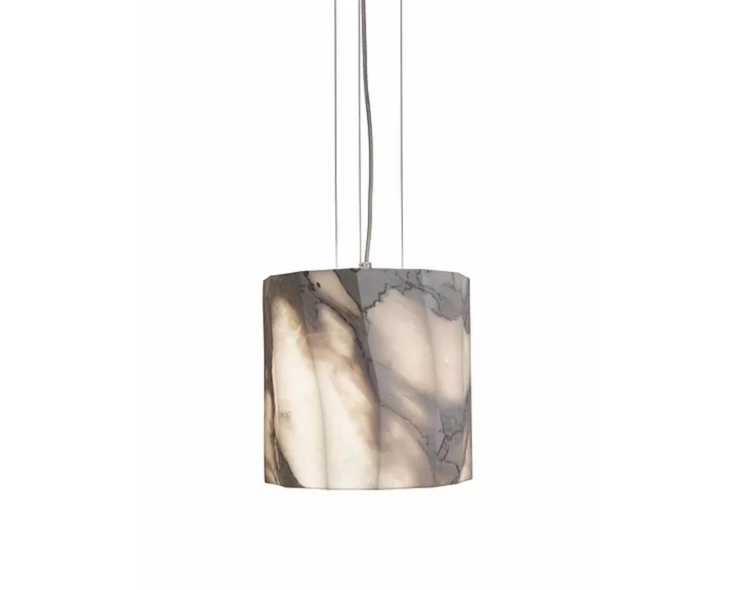 Fiamma large marble pendant by Marmi Serafini
Materials: Calacatta marble
Dimensions: Ø 25, H 25 cm

All our lamps can be wired according to each country. If sold to the USA it will be wired for the USA for instance.

The stone material of