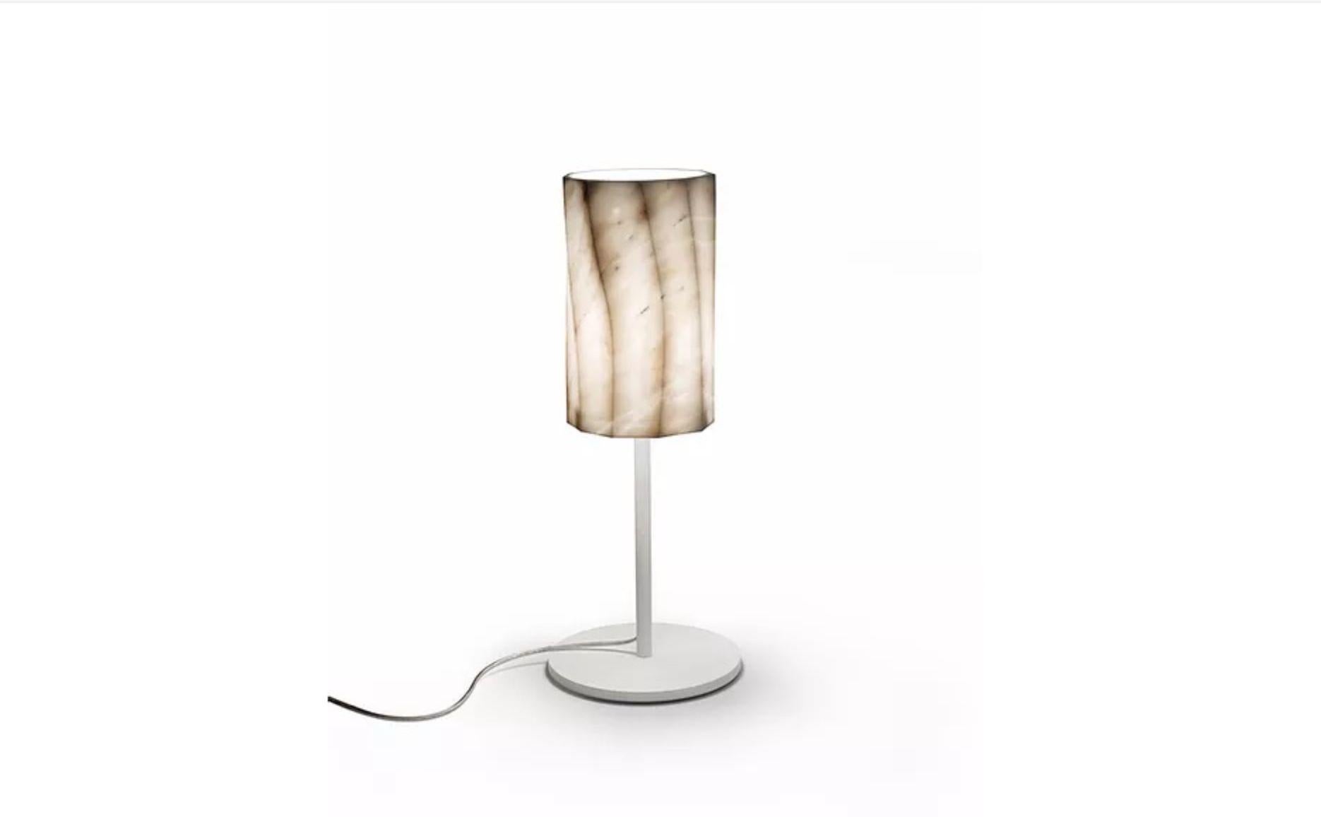 Fiamma marble table lamp by Marmi Serafini
Materials: Calacatta marble
Dimensions: Ø 20, H 50 cm

All our lamps can be wired according to each country. If sold to the USA it will be wired for the USA for instance.
The stone material of