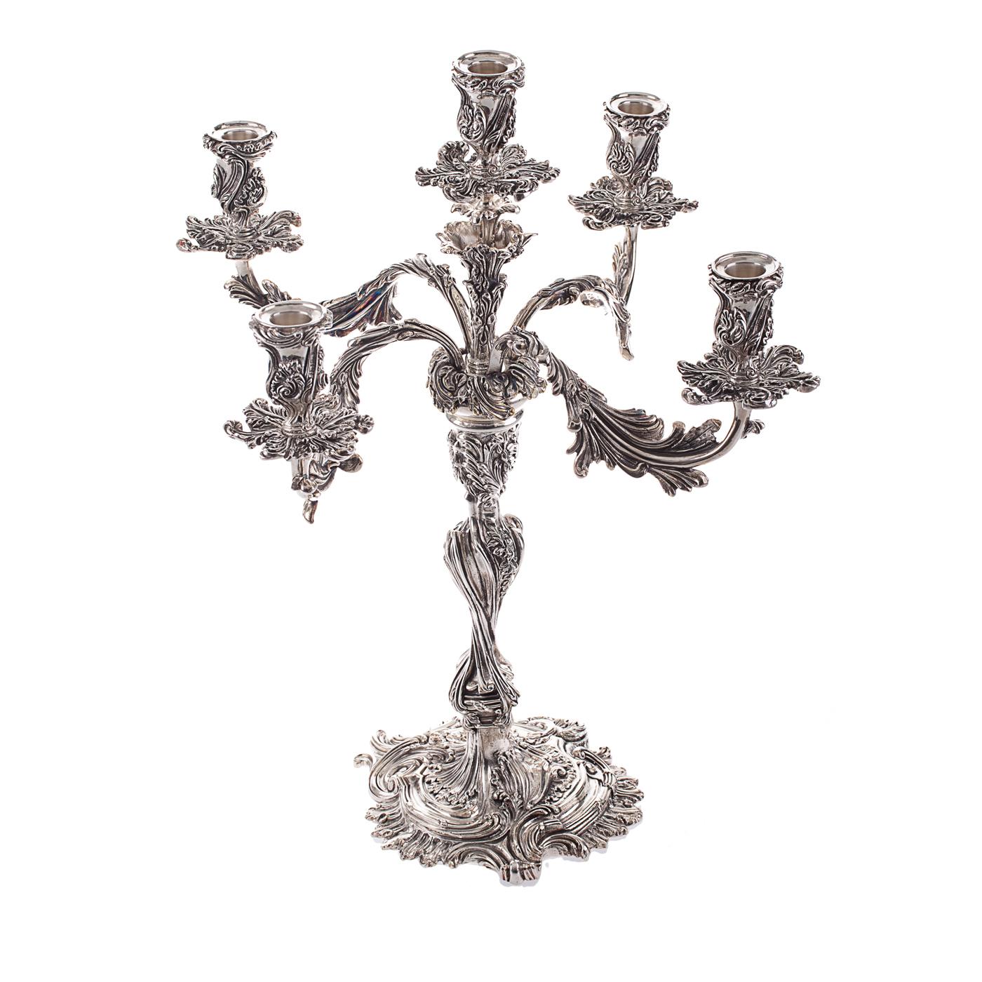 Chiseled with intricacy in the Baroque tradition, this sterling silver five-arm candelabra features magnificent floral motifs. The Florentine silversmith atelier Pampaloni achieved an unparalleled level of detail in this signature piece, an object