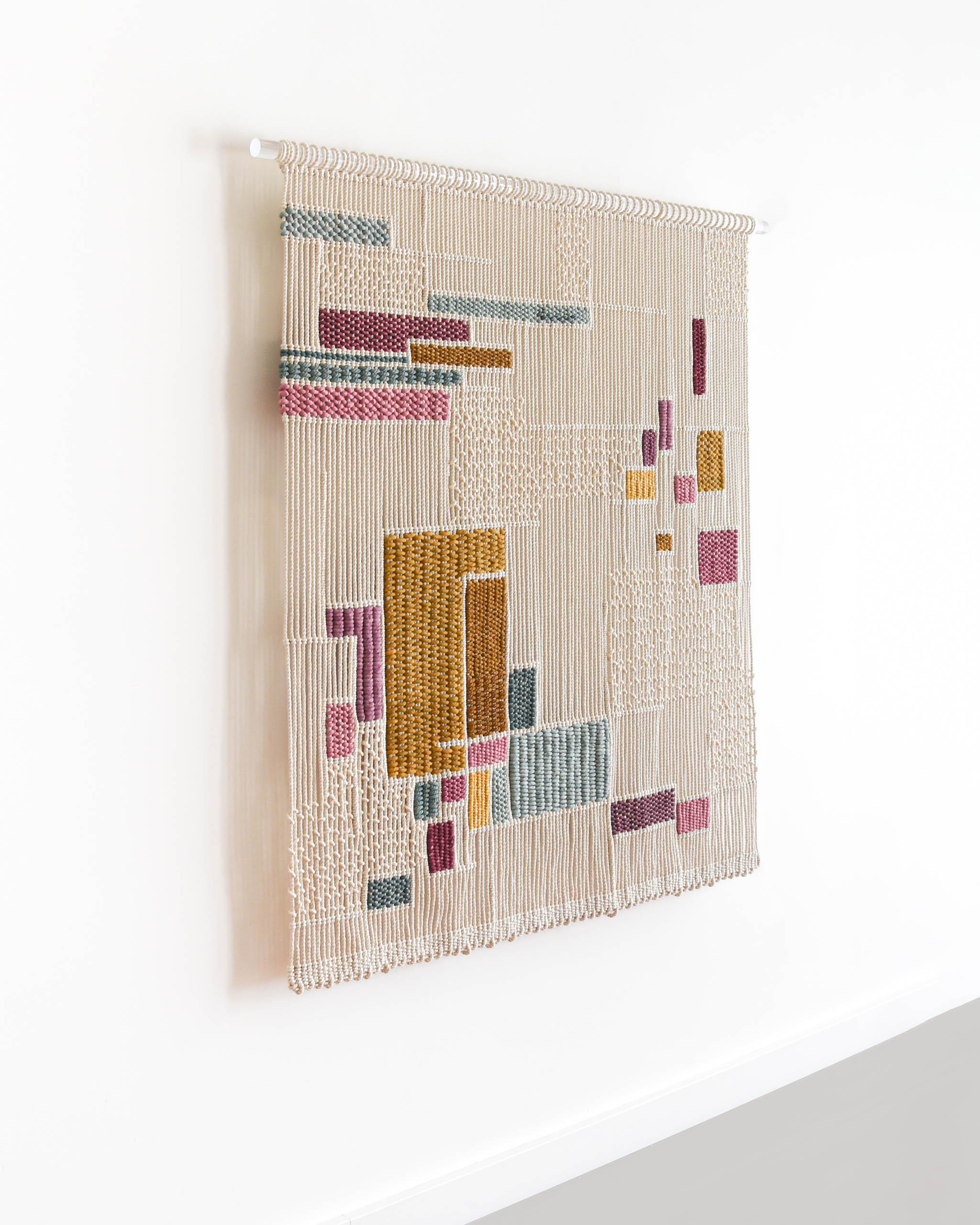 TABULA COLORUM is a macrame / woven fiber art tapestry (wall hanging) created by Tamar Samplonius.  

'Tabula Colorum is an exploration of color and shape. With this woven fiber art tapestry, I focused on combining bold colors in a way that feels