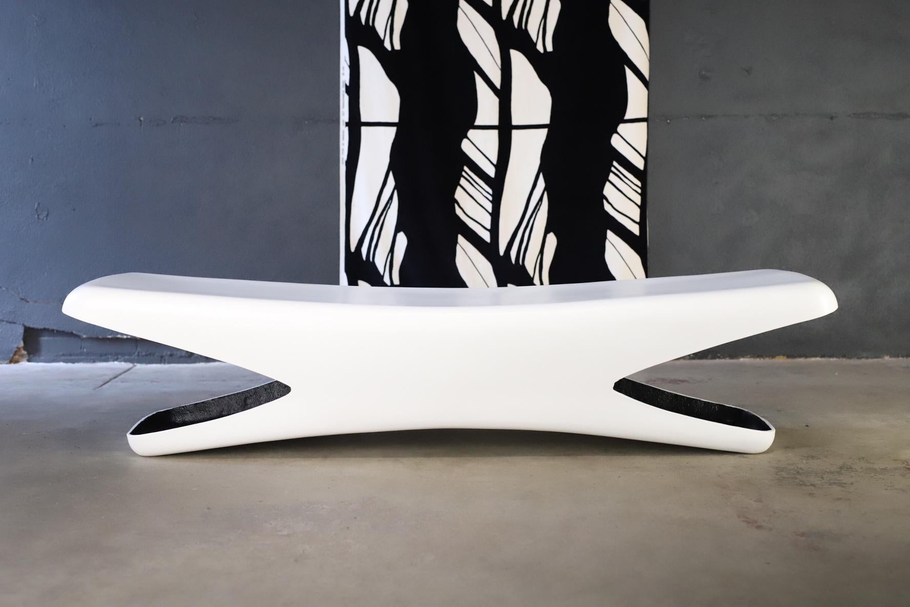 Wonderful space age indoor or outdoor fiberglass bench designed by Douglas Deeds for Sintoform Architectural Fiberglass. Bench has been professionally restored and painted in a flat white paint for outdoor use. Photographed with Herman Miller Eames