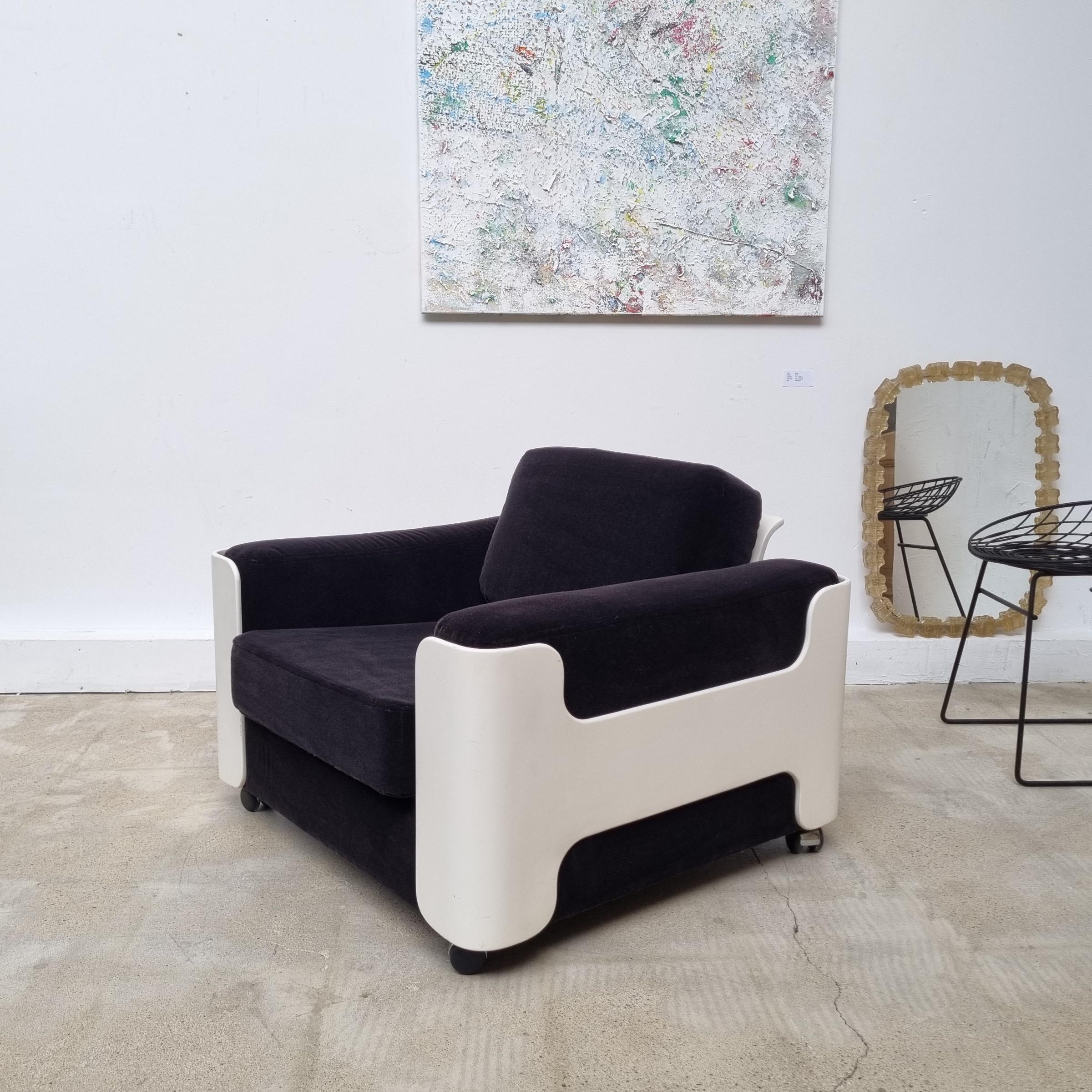 Impressive fiberglass lounge chair in the style of Joe Colombo, Italy, 1970s. Newly upholstered in beautiful black velvet.
 