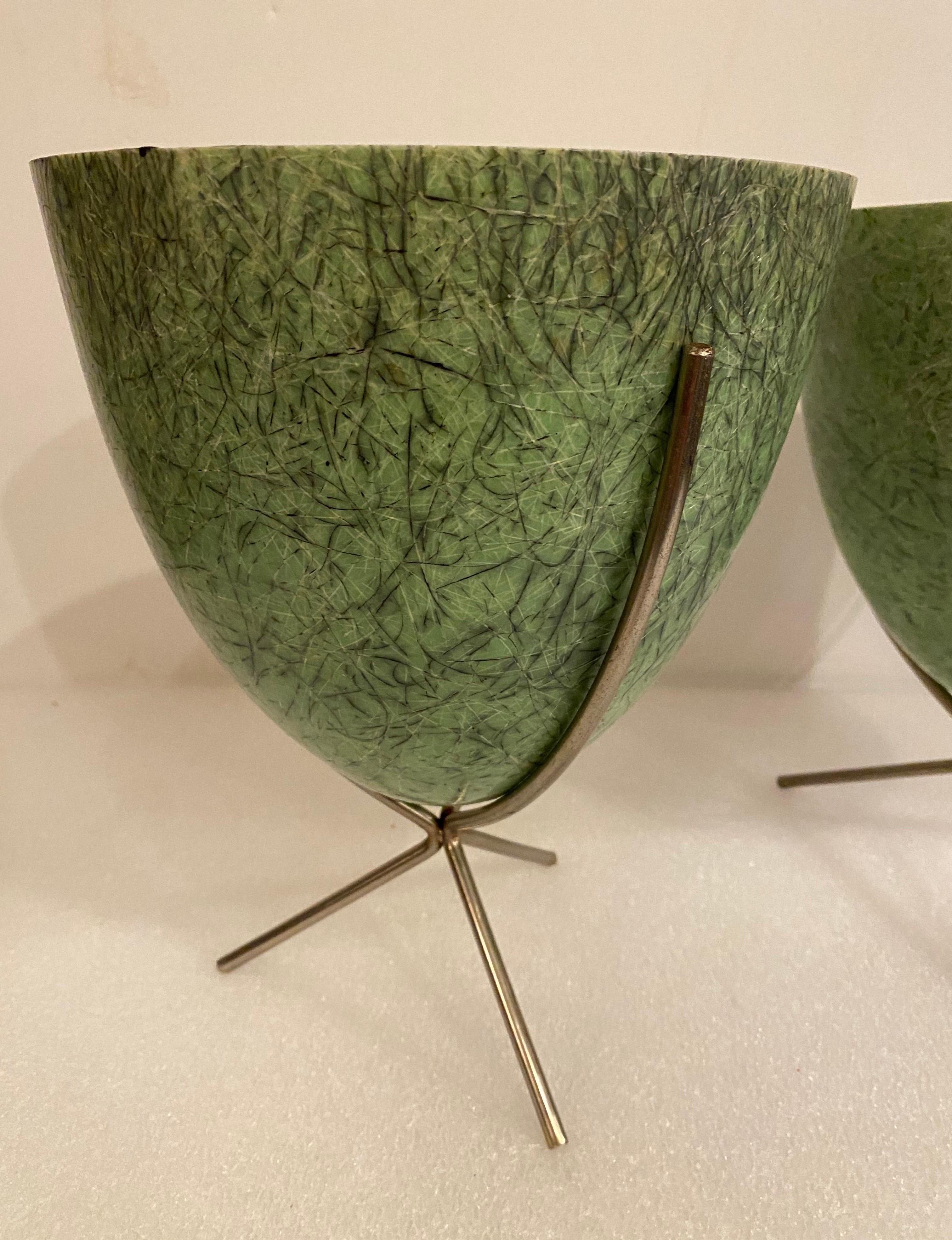 Pair of Fiberglass Bullet Planters probably by Kimball.  Fiberglass had been painted black at some point and outside stripped back to green.  Some paint still remains on inside of planters and some paint in the fibers showing on the outside.  hard