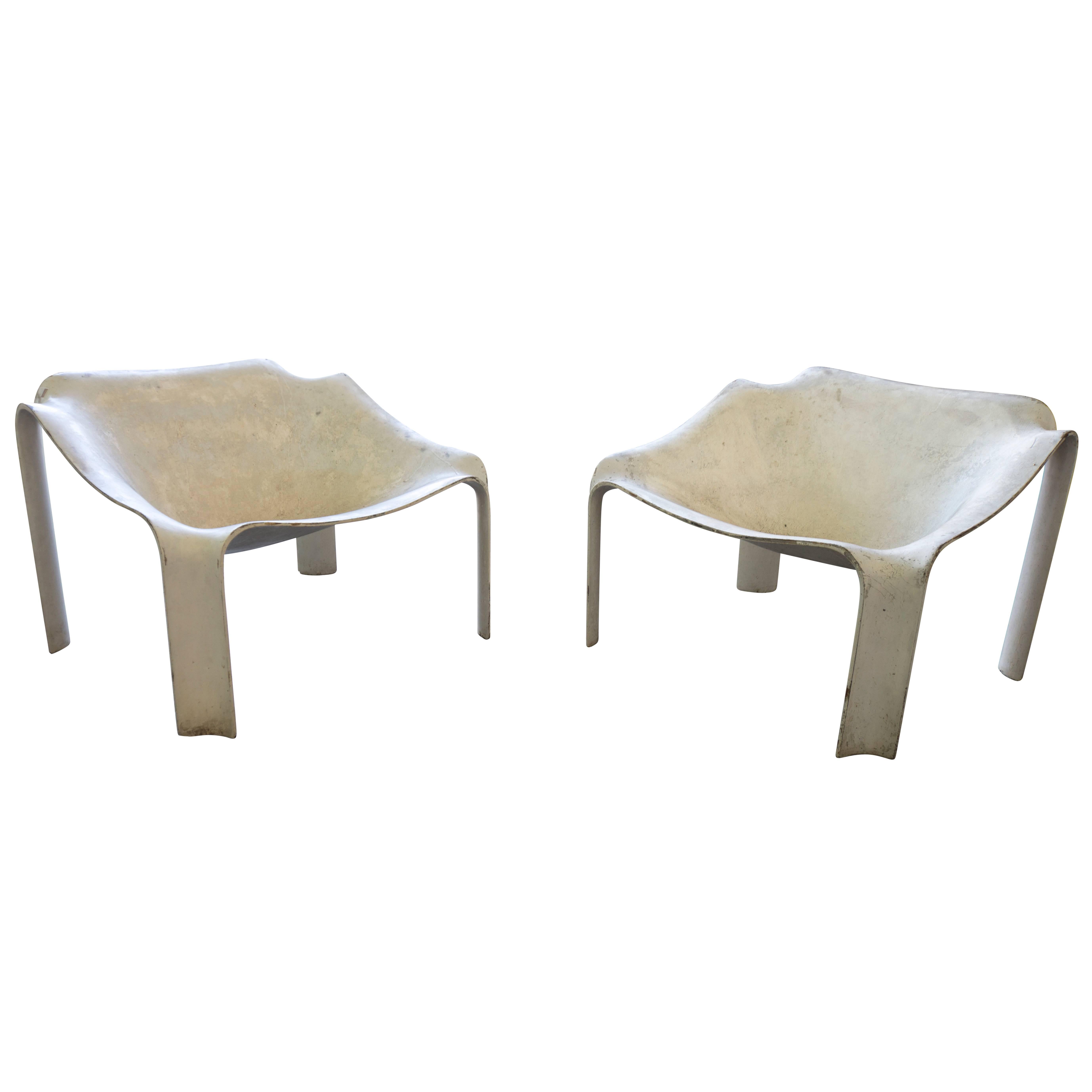 Pair of rare fiberglass chairs by French artist Pierre Paulin, circa 1960. These are the F300 series for Artifort, a French furniture manufacturer. Over the years this style of chair and others from Paulin have seen a steady increase in value. The