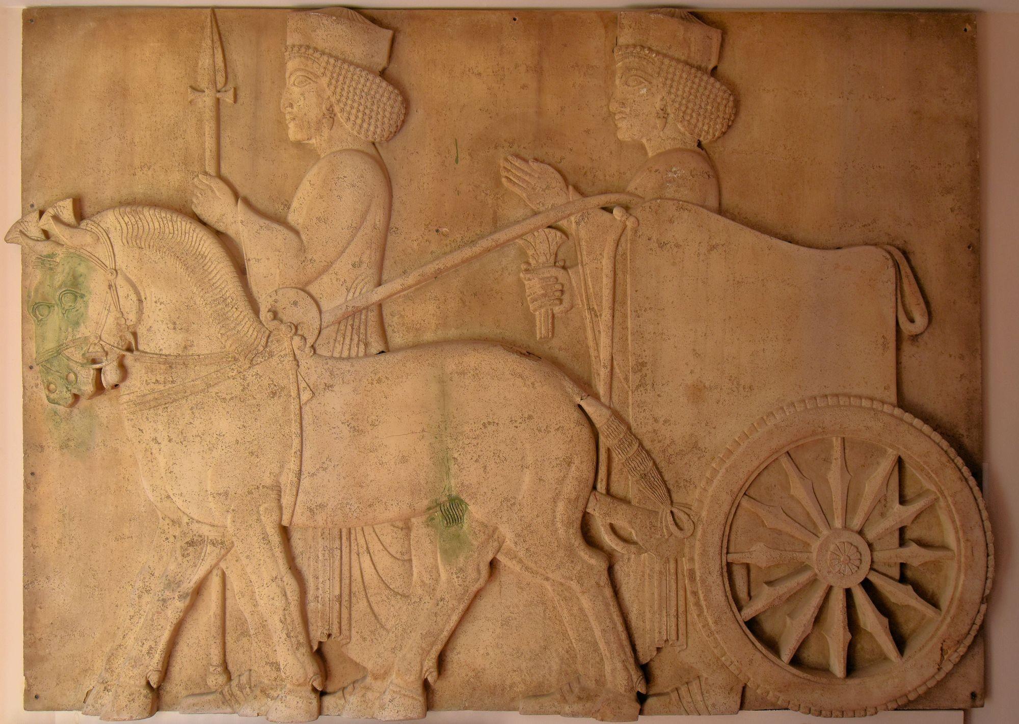 Fiberglass Mesopotamian Wall Art Movie Prop from the classic Ben-Hur, 1959 starring Charlton Heston won at the time a record-breaking 11 academy awards. The fiberglass relief mimics a stone carving of 2 warriors with a chariot and horse. It comes