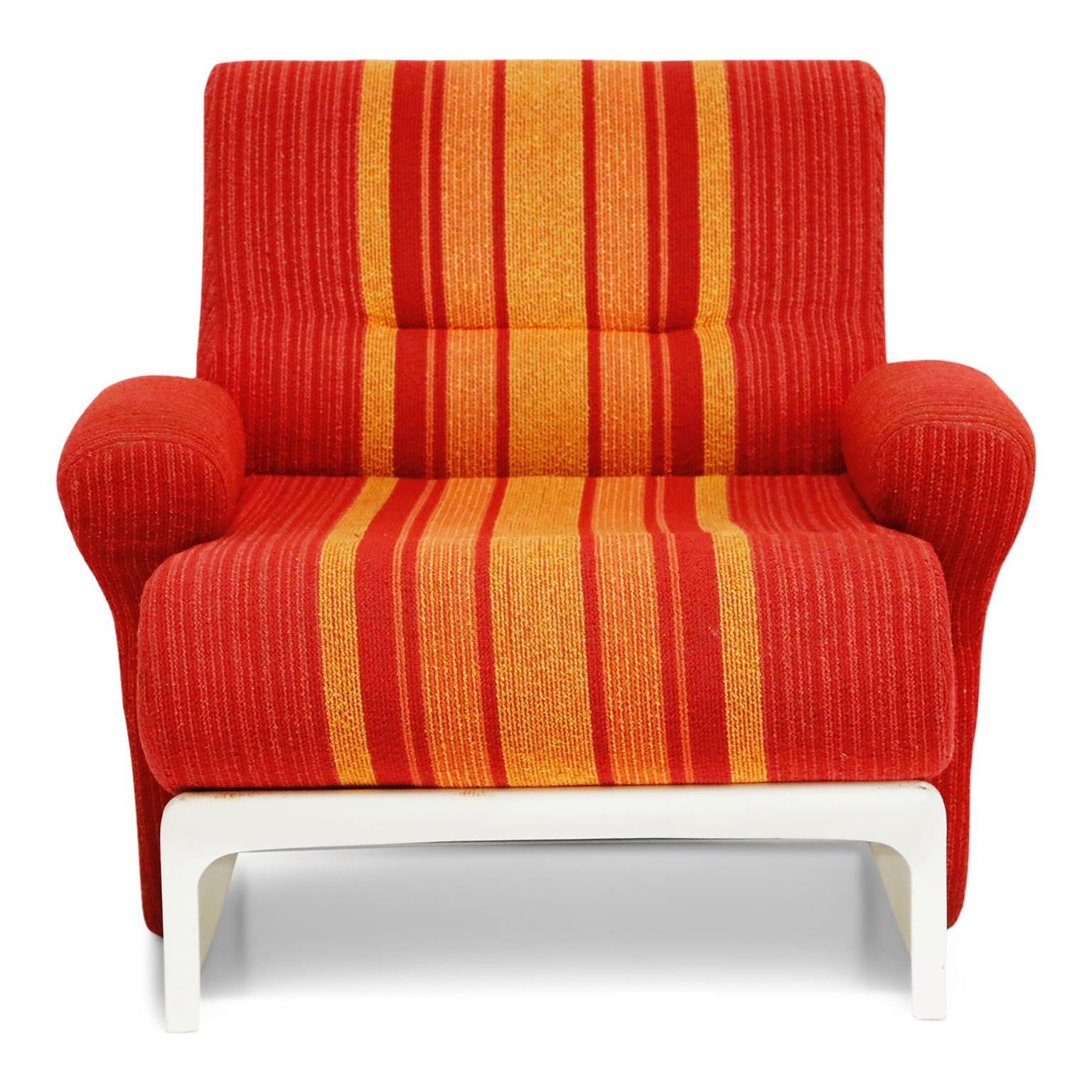 An incredible set of 1960s fiberglass lounge chairs by Ernst Moeckl, sourced from a boutique hotel on the Baltic Sea, these fantastic scoop armchairs feature red, orange and yellow striped fabric that is in very good condition and is ready to be