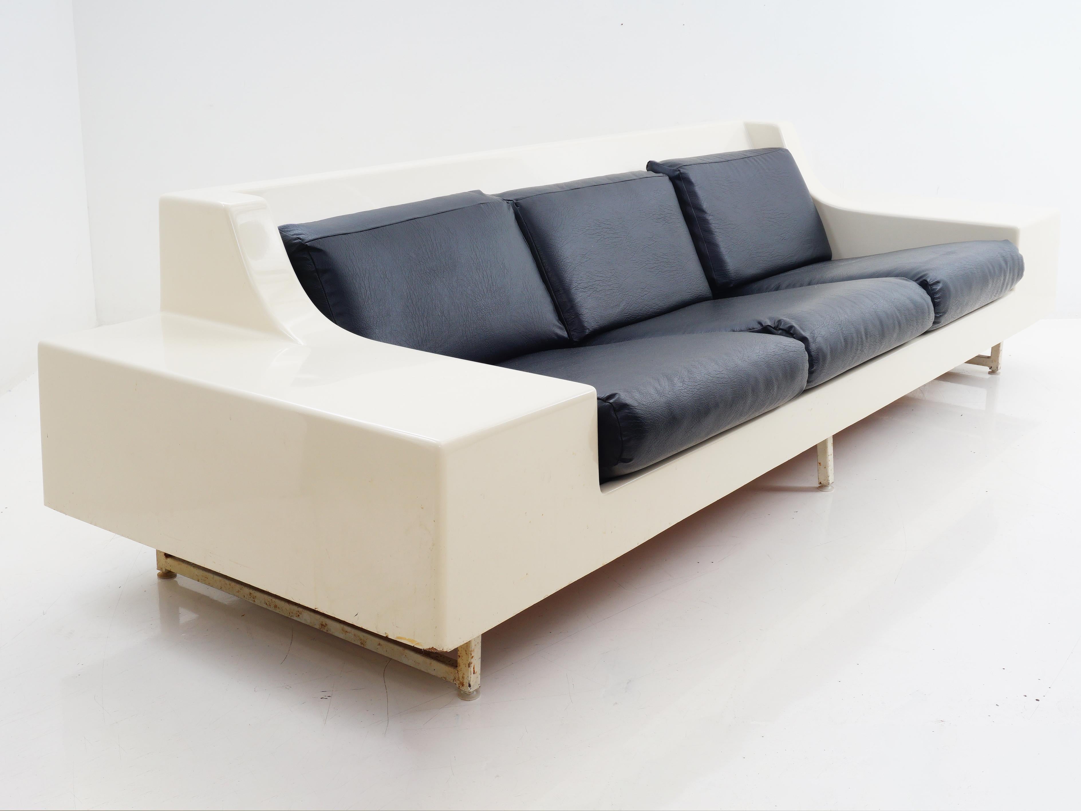 Step into a time capsule of comfort with Homecrest's 1965 three-seat sofa. With its off-white fiberglass frame, it's the groovy embodiment of midcentury vibes – perfect for channeling your inner Edie Sedgwick. Sip your cocktails and lounge like it's