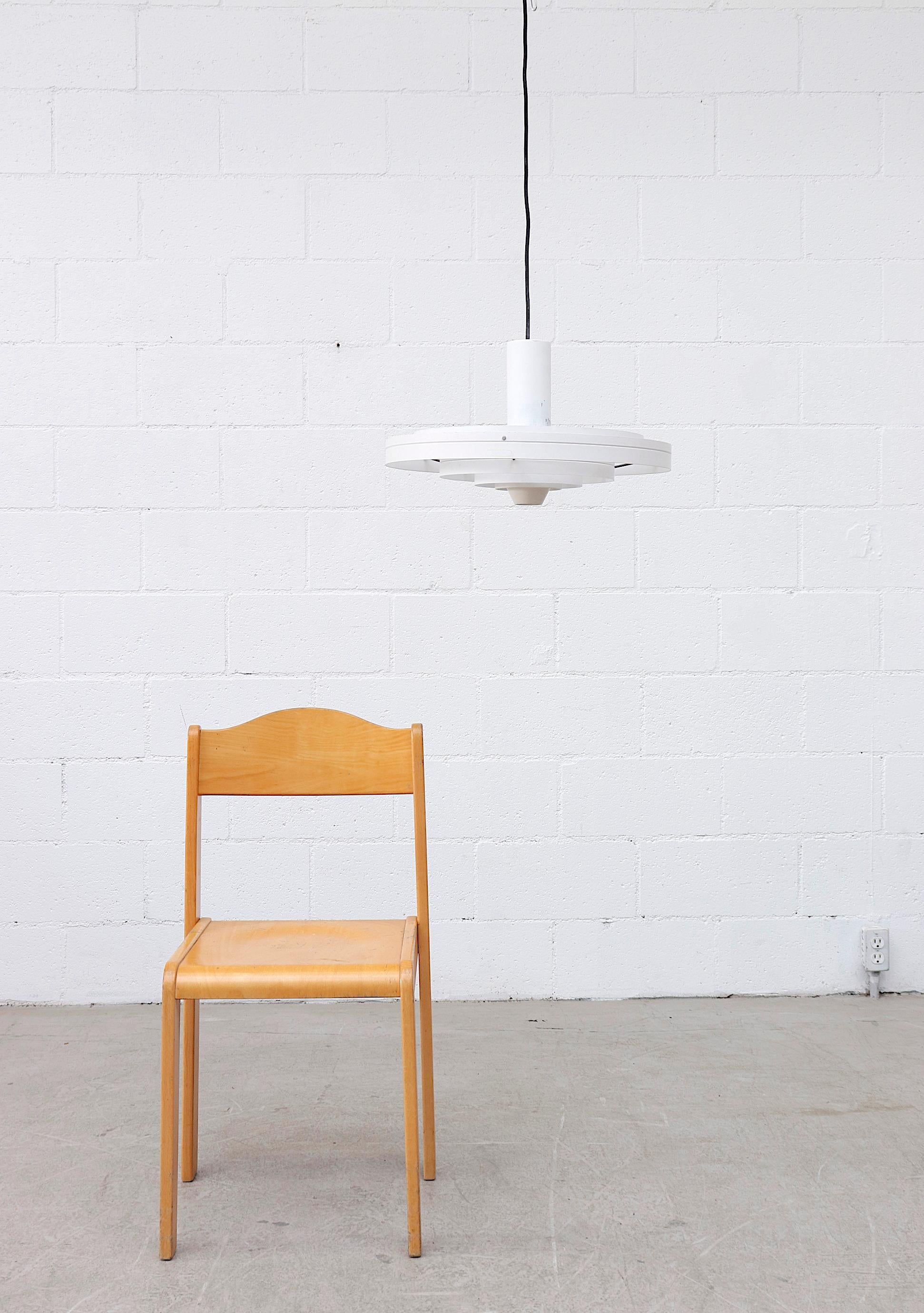 Award-Winning 'Fibonacci' UFO pendant light with white enameled with black enameled metal accents by Sophus Frandsen for Fog & Mørup, Denmark, 1963. In original condition with visible wear and scratching, consistent with its age and usage.