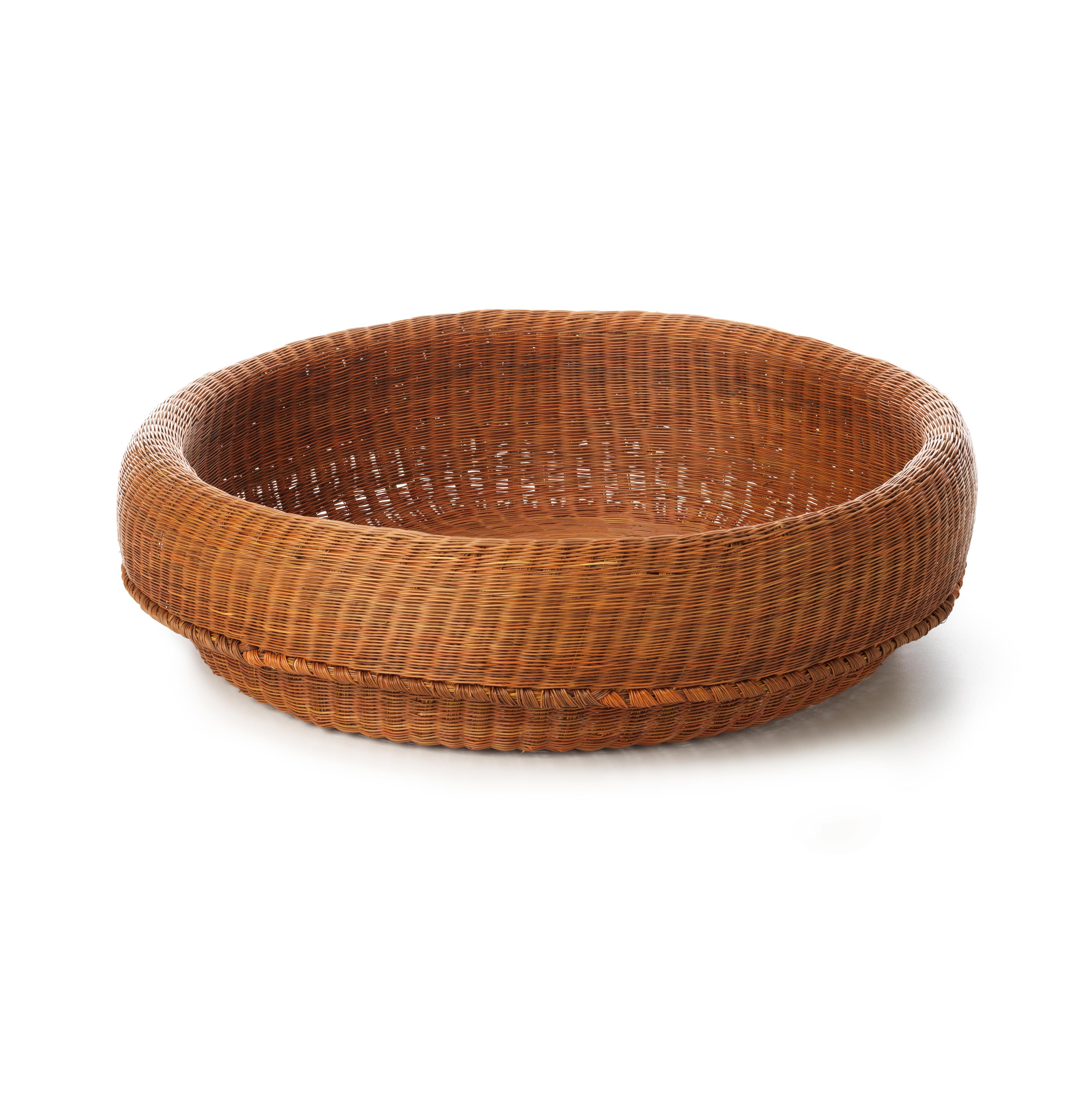 Fibra medium basket by Sebastian Herkner
Materials: 100% esparto grass. 
Technique: Hand-woven in Colombia. 
Dimensions: Diameter 47 cm x width 34 x height 10 cm 
Available in colors: natural, red, black, and, cobre. And other sizes. 

The