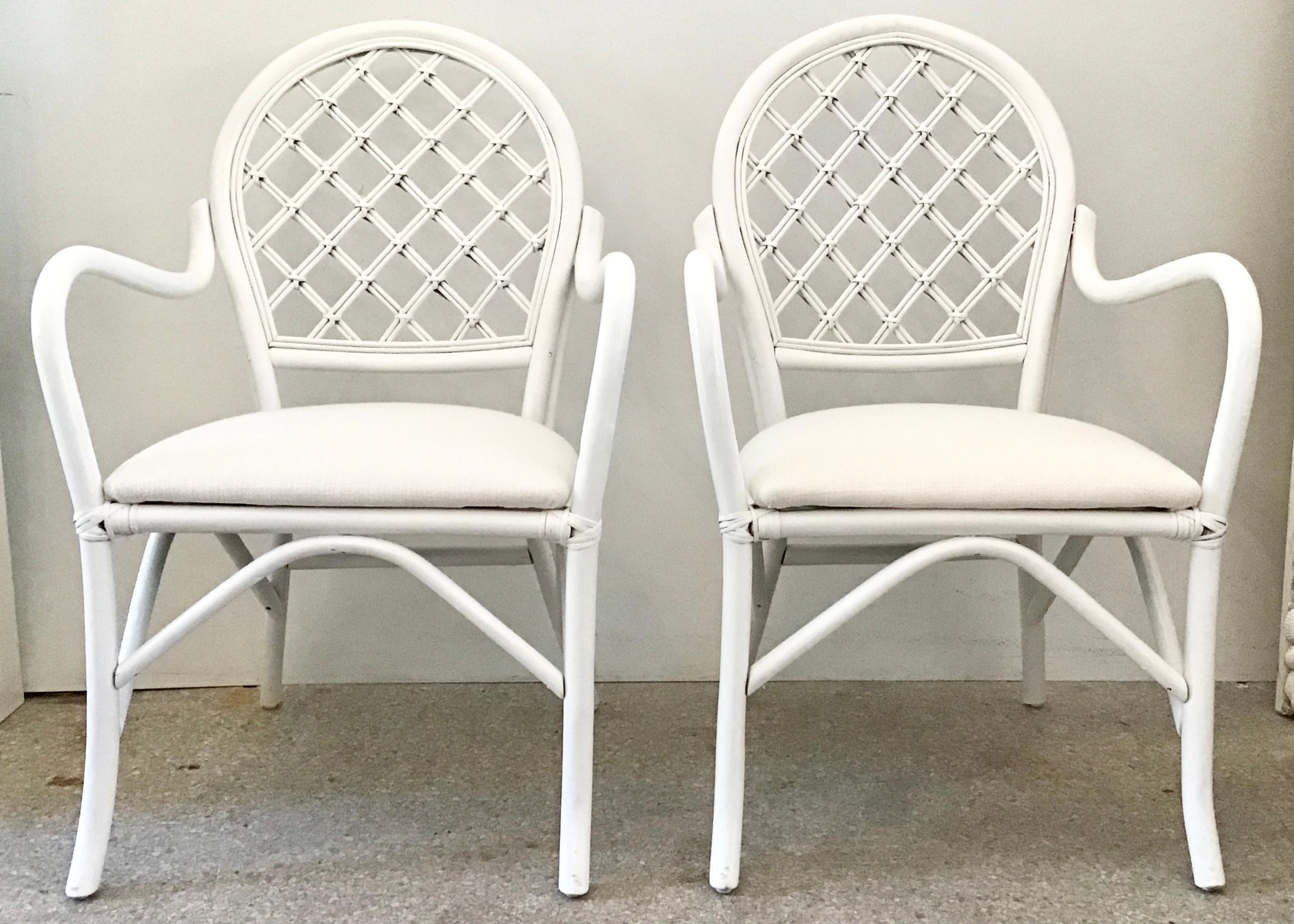 Fabulous pair of Ficks Reed arm chairs with new Todd Hase upholstery. Would make a great addition to your boho chic inspired home.