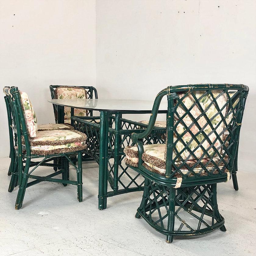 Ficks Reed oval dining set
There are 4 side chairs 2 swivel armchairs and table with oval glass top. Repairs and refinishing is recommended.

Oval table: 76 W x45 D x 29 H
Swivel chair: 23 W x 26.5 D x 35 H SH 19
Side chair: 19 W x 22 D x 33.5
