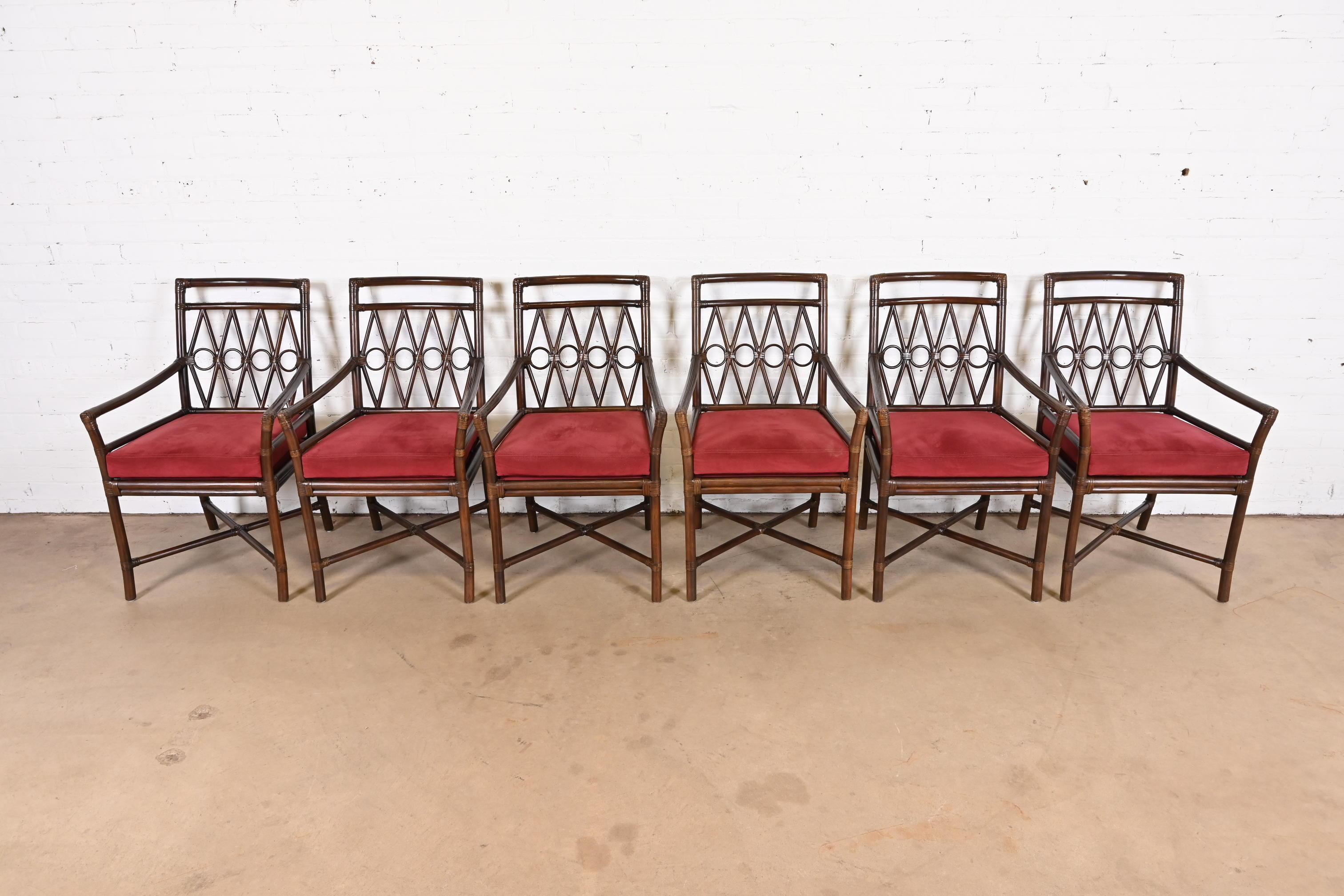 A gorgeous set of six Hollywood Regency Organic Modern dining armchairs

By Ficks Reed

USA, Circa 1980s

Bamboo rattan frames, with leather binding and upholstered seat cushions.

Measures: 22.5