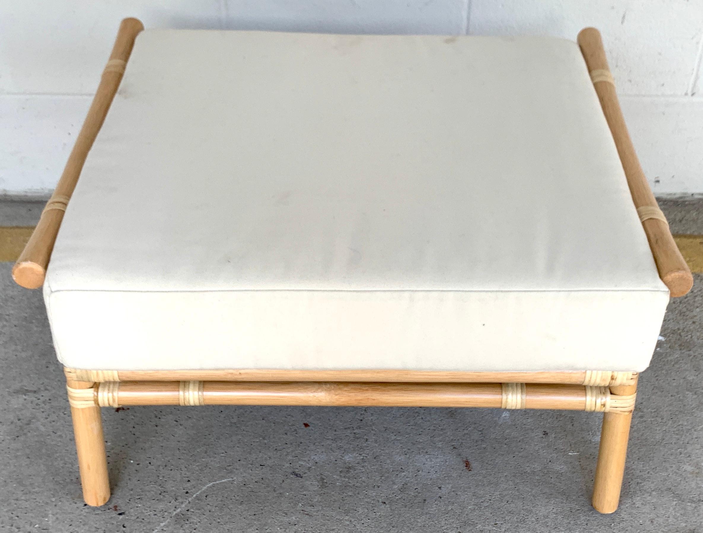 Ficks Reed natural rattan ottoman by John Wisner, Restored
With beautiful natural finish, sturdy construction Complete with muslin template cushion. The cushion is useable, shows some wear, ready for COM.
The height without the cushion is 13