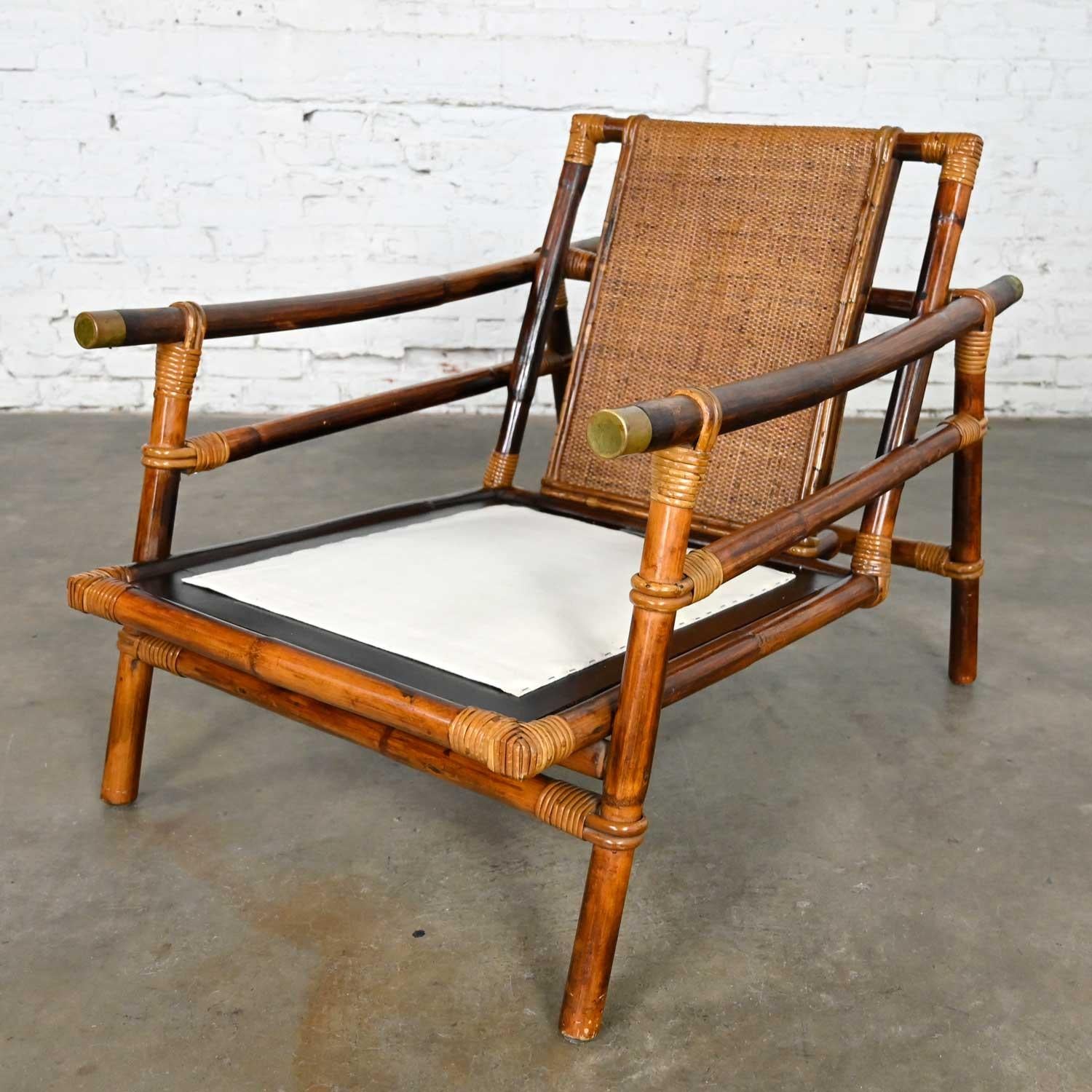 Ficks Reed Rattan Campaign Style Far Horizons Lounge Chair by John Wisner In Good Condition In Topeka, KS