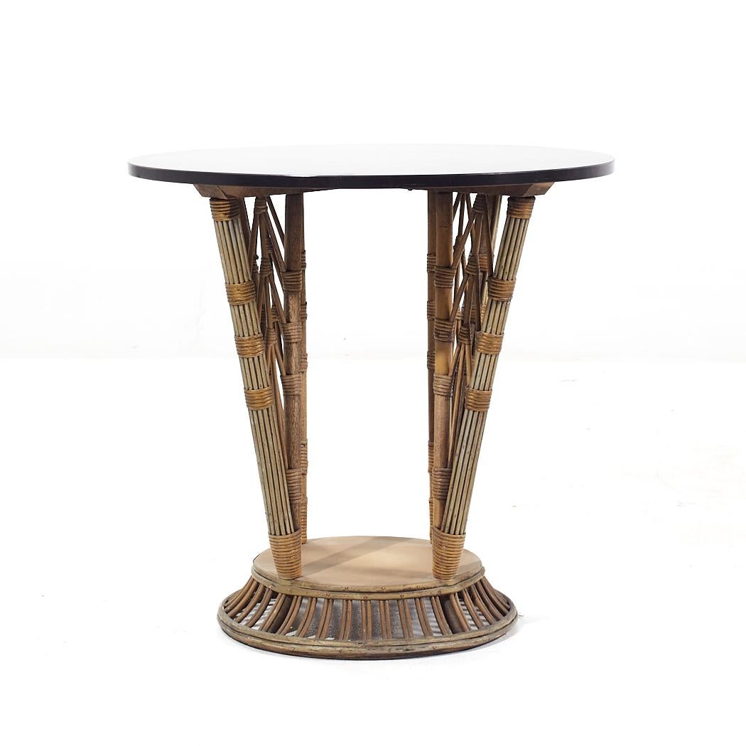 Ficks Reed Style Mid Century Round Rattan Table

This table measures: 28 wide x 28 deep x 27.25 inches high

All pieces of furniture can be had in what we call restored vintage condition. That means the piece is restored upon purchase so it’s free