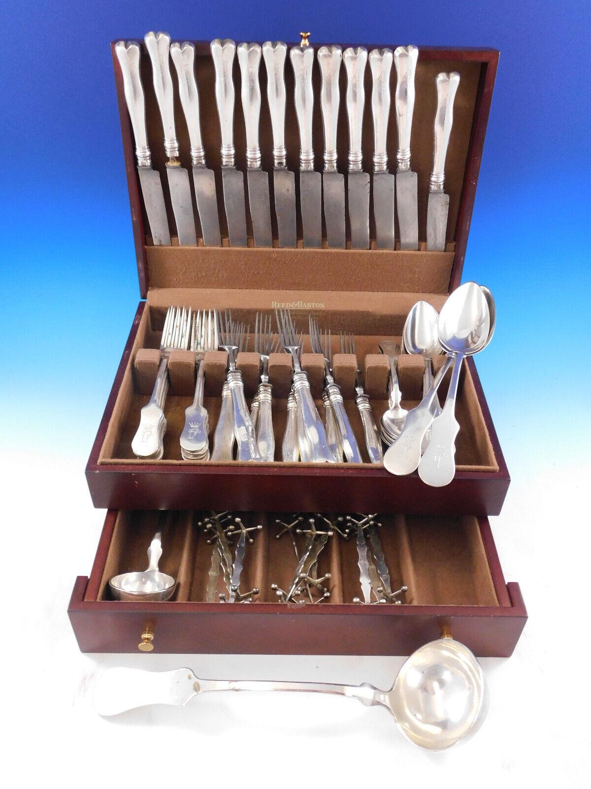Fiddle by Thomas Dub, Vienna Austria 1812 silver flatware set with hallmark for the year 1863 - 66 pieces. This set includes:
12 Large dinner knives w/steel blades, 10 3/4