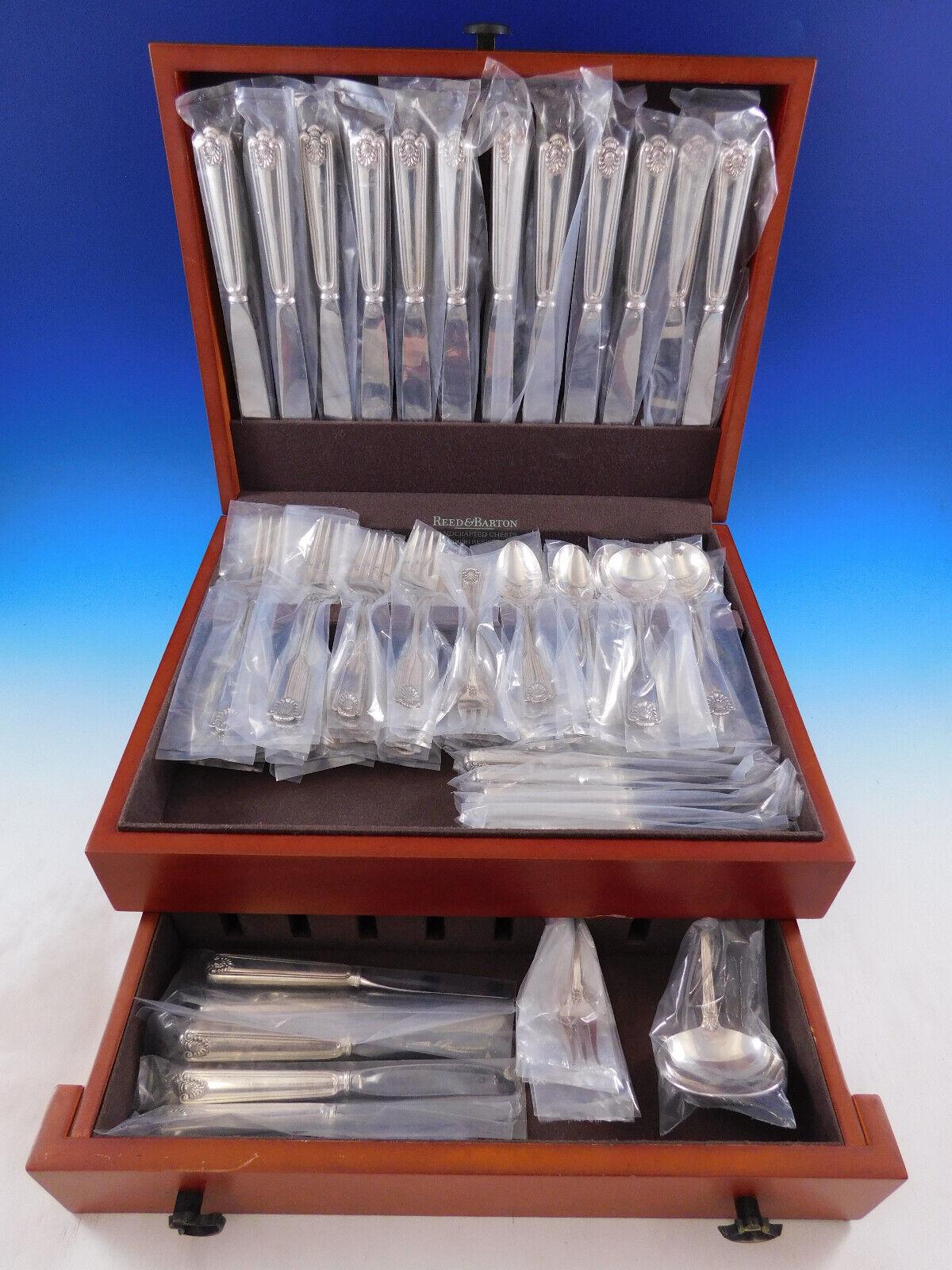 Dinner Size Fiddle Shell by Frank Smith Sterling Silver Flatware set, 85 pieces. This popular Classic pattern was first offered in 1914 and was discontinued in 2003. This set includes:
12 Dinner Size Knives, modern blades, 9 1/2