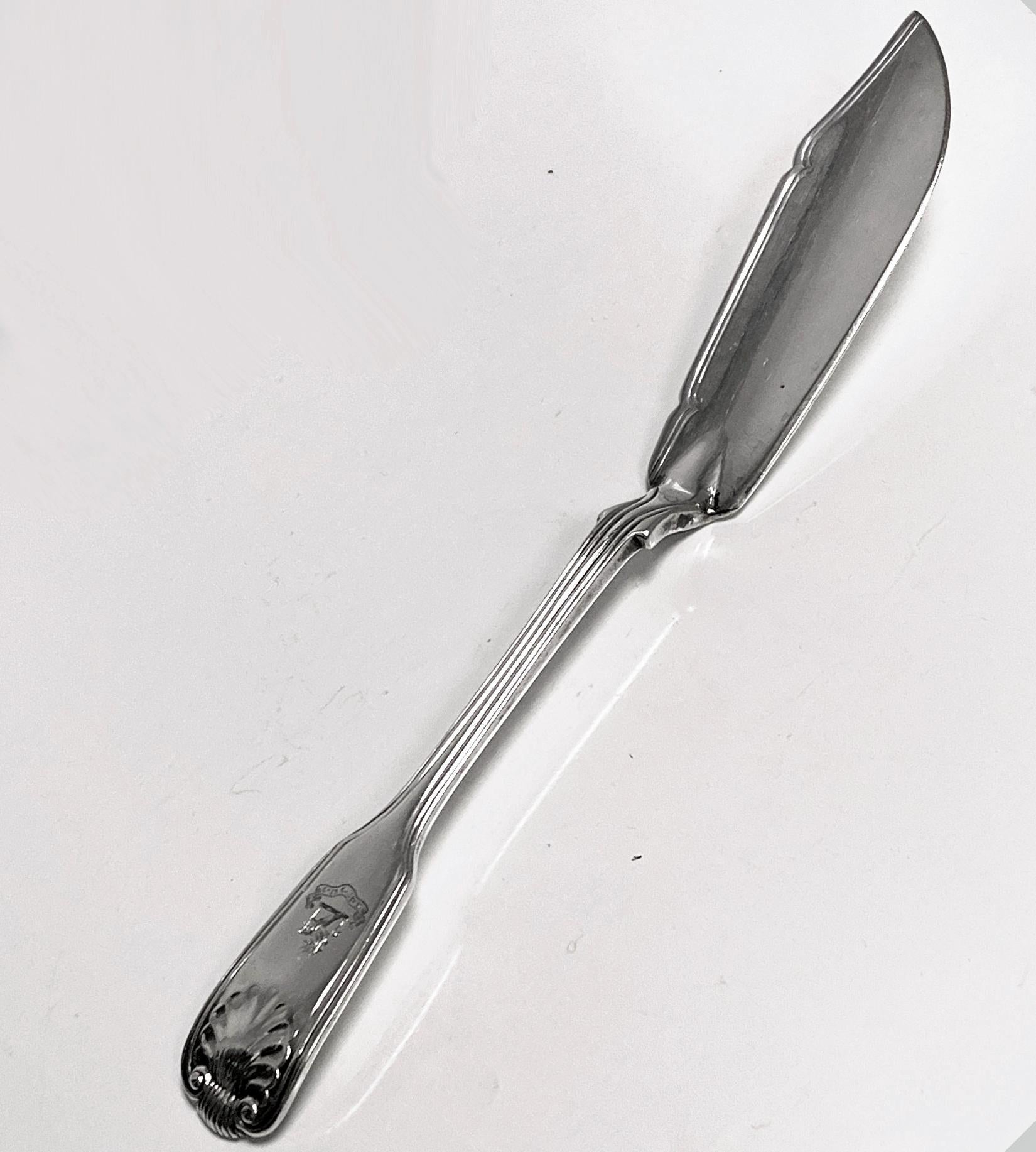 Fiddle Thread Shell Silver Butter Knife London 1841. Length: 7.5 inches. Weight: 2 oz.
