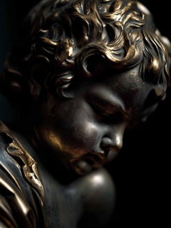Puti in bronzo dorato
