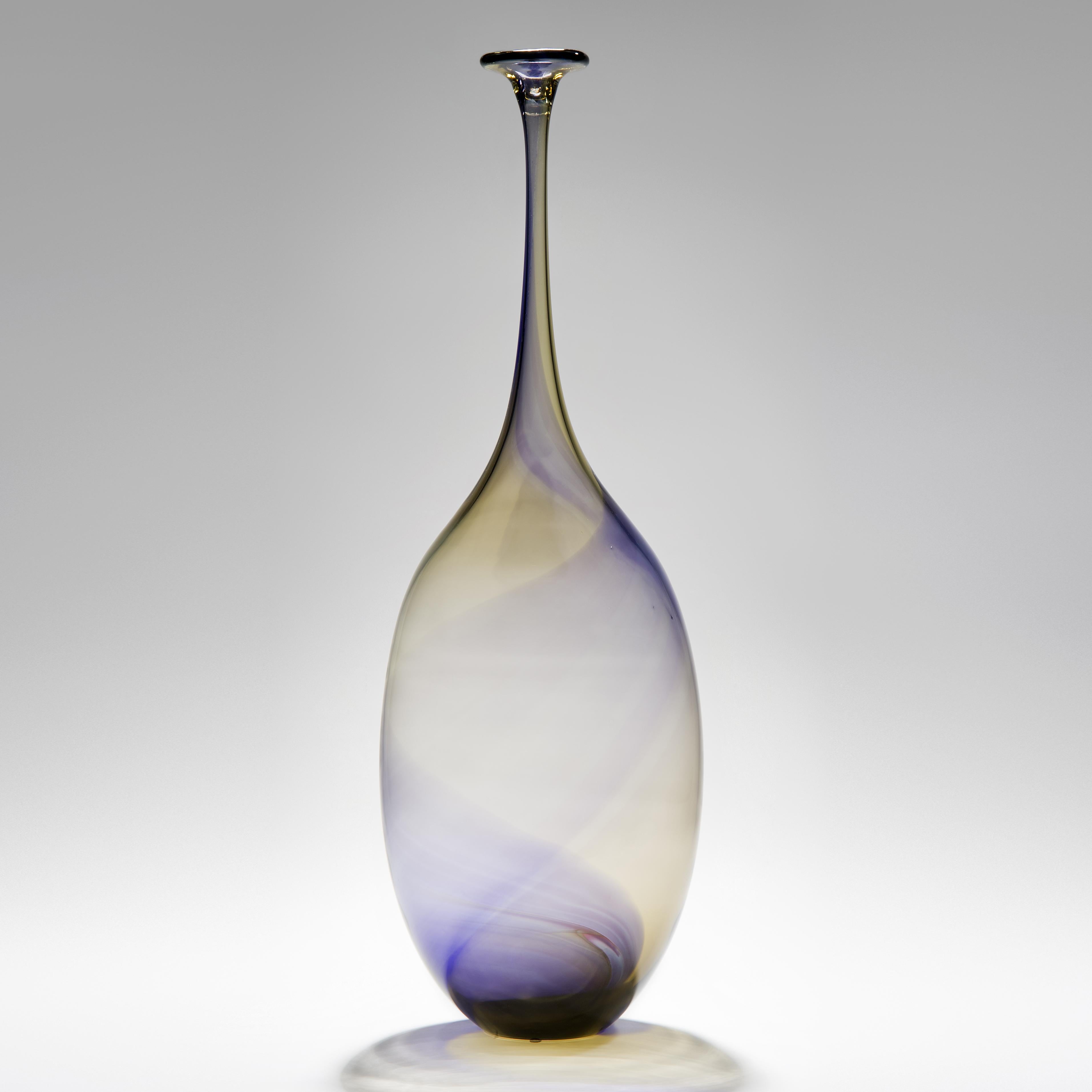 Fidji I is a unique bronze & purple sculptural tall bottle, by the Swedish artist Kjell Engman for Kosta Boda.

The Fidji series was inspired when Engman accidentally spilled oil into water. Remaining on the water's surface, the oil floated and