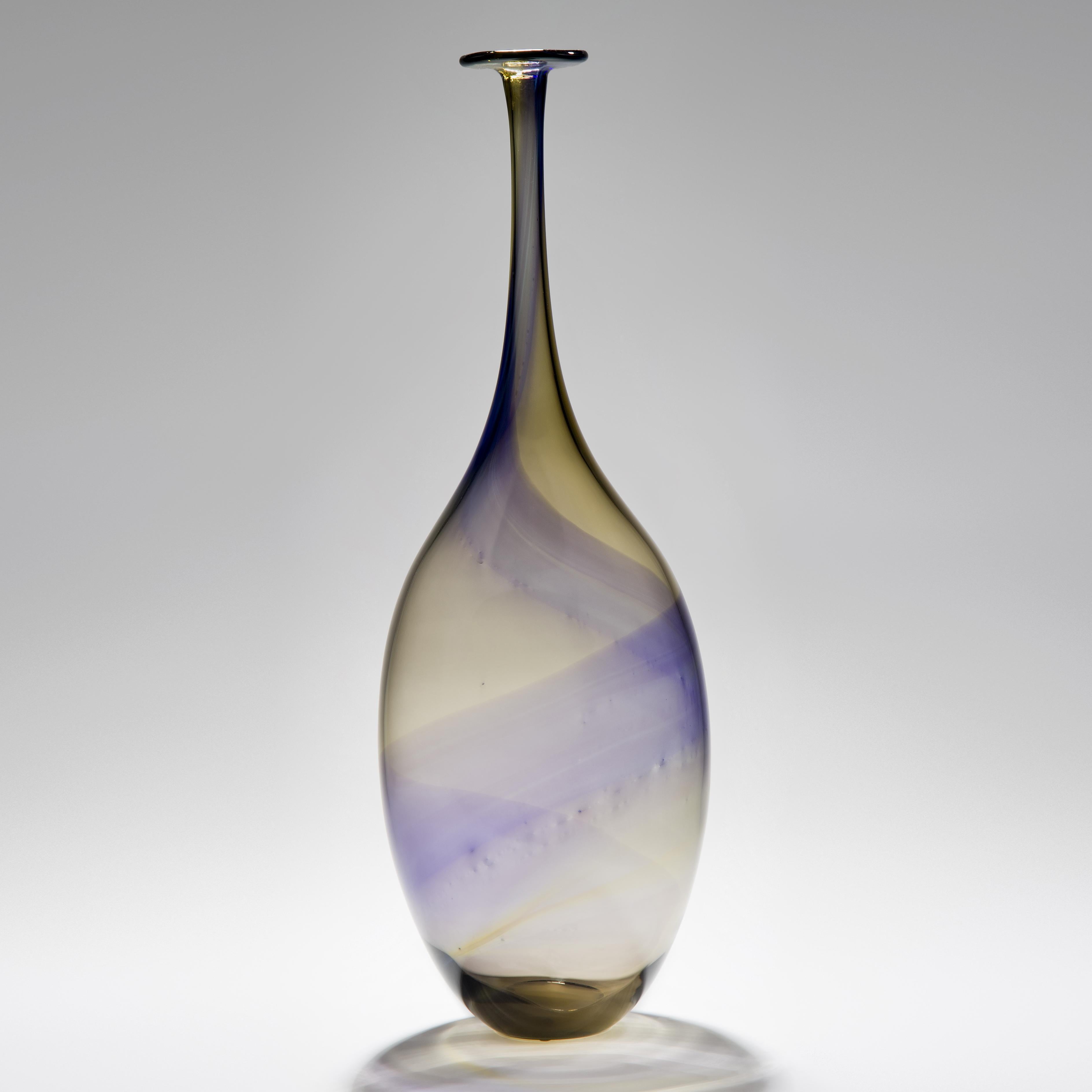 Fidji III is a unique bronze & purple sculptural tall bottle, by the Swedish artist Kjell Engman for Kosta Boda.

The Fidji series was inspired when Engman accidentally spilled oil into water. Remaining on the water's surface, the oil floated and
