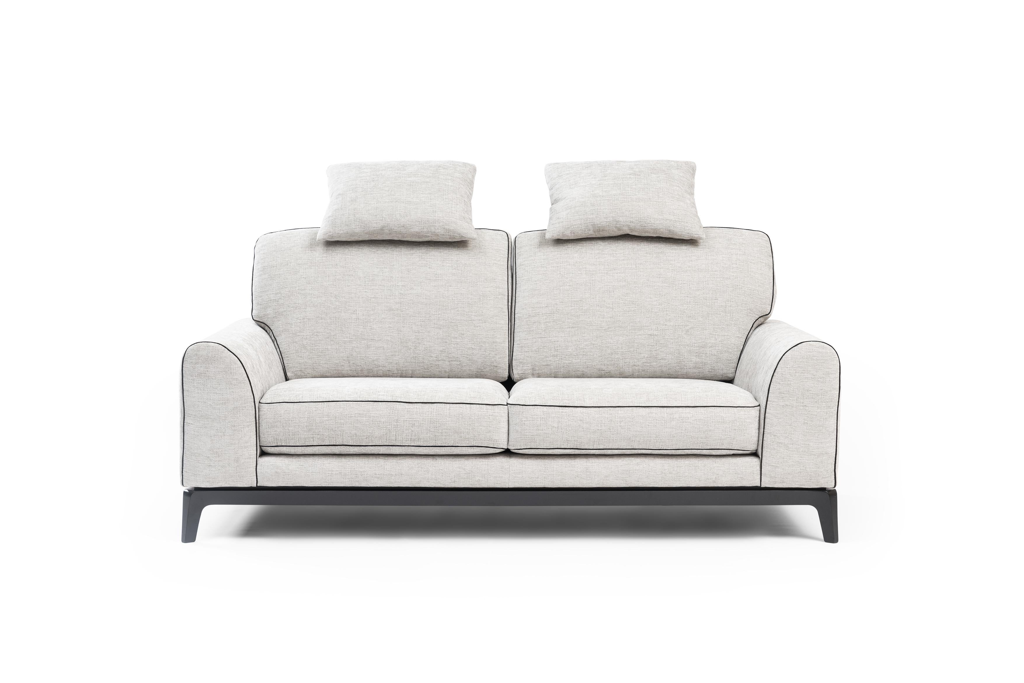 Fidji Sofa by RALPH M
Dimensions: W 210 x D 92 x H 86-107 cm. 
Materials: Solid beech, Fabric, Plywood.

Details: 
Frame: Plywood panels and solid beech supports.
Seat springing: Interlaced elastic webbing.
Seat cushion: High resilience 36kg/m3 foam