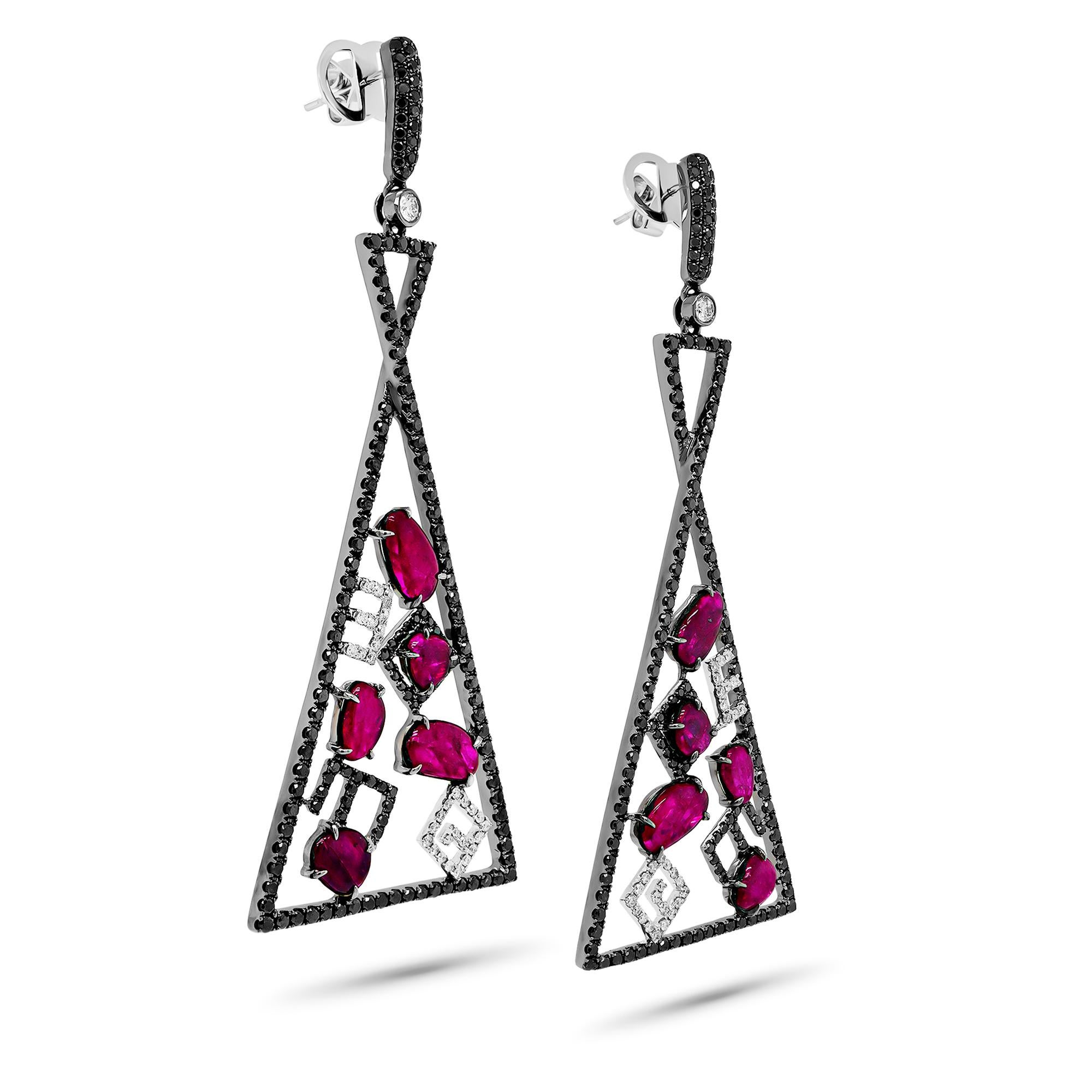 Discover the epitome of elegance with these stunning earrings, featuring a 7.91 carat vivid red ruby paired with 4.39 carats of natural diamonds, all meticulously set in 18K gold. These earrings are a celebration of luxury and sophistication,