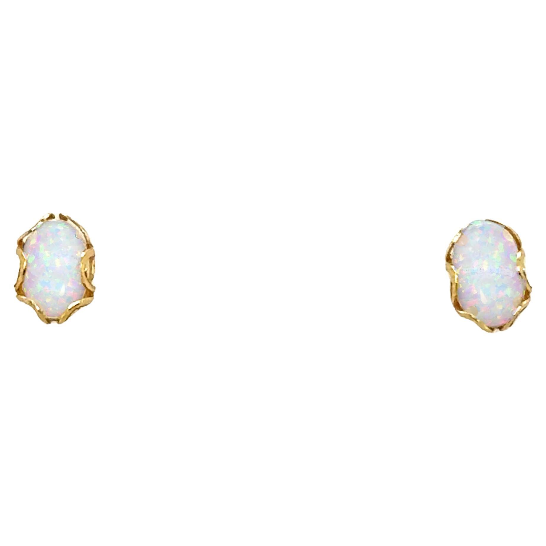 Clous d'oreilles Pushback Oval Cabochon en or jaune 14 carats en vente