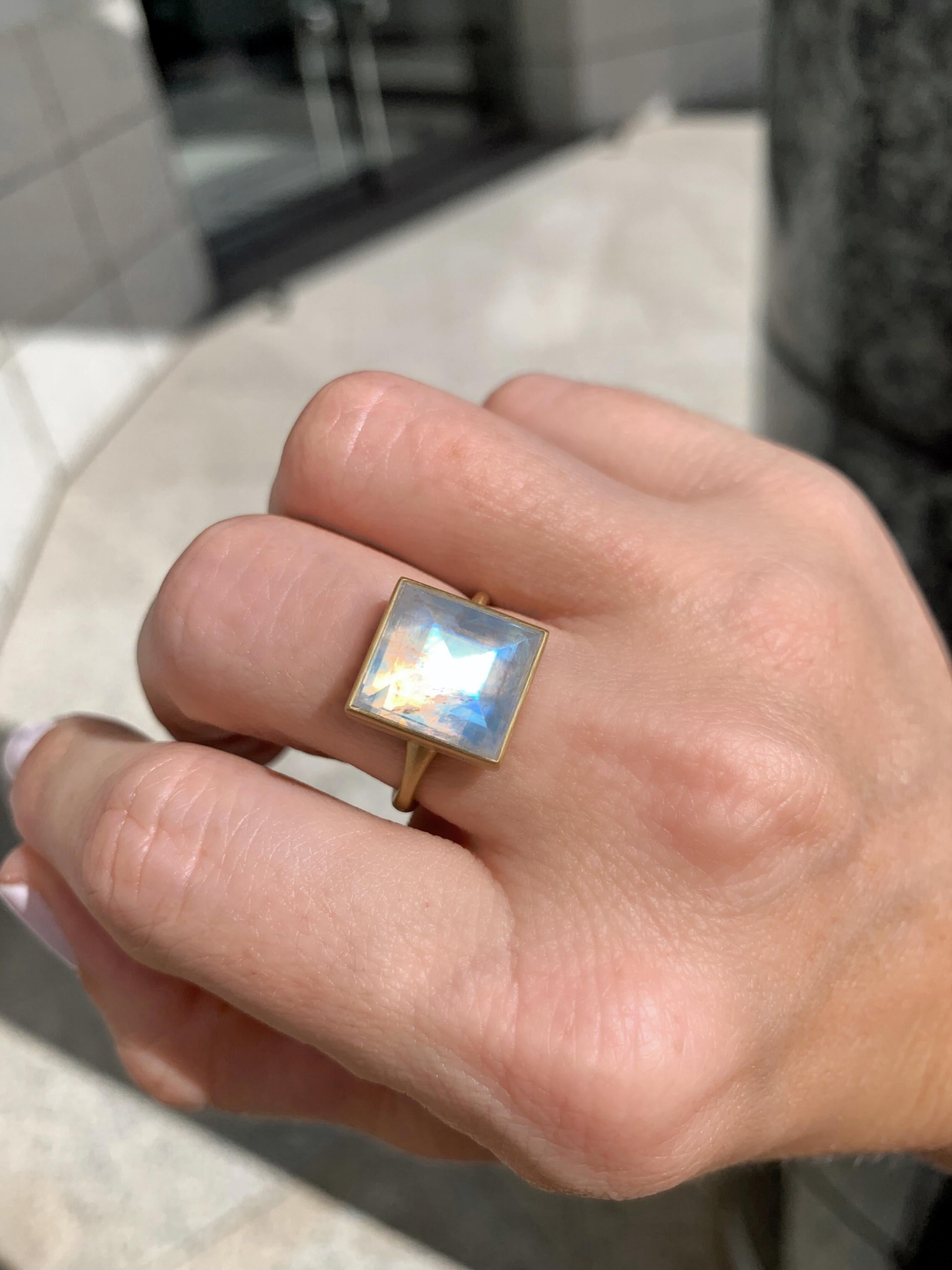 One of a Kind Ring handmade by renowned jewelry maker Lola Brooks showcasing a fiery glowing 8.41 carat faceted rainbow moonstone in Lola's signature-finished 18k yellow gold on a tapered band. Stamped and Hallmarked. 

Size 7.25 (can be sized upon