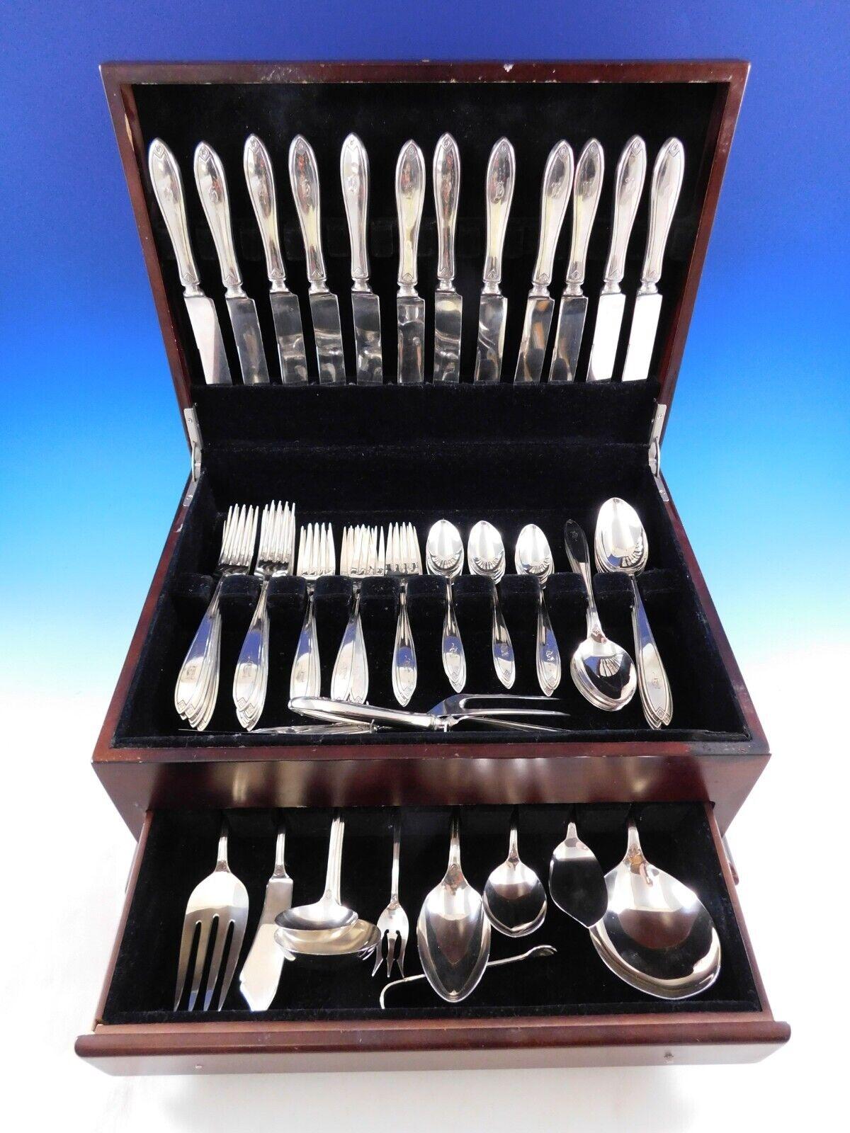 Fiesta by Hallmark sterling silver Dinner Size Flatware set, 73 pieces. This set includes:

12 Knives, 8 3/4
