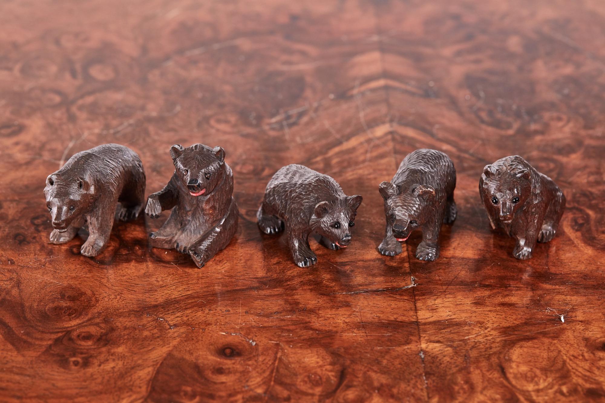 English Fifteen Antique Miniature Carved Black Forest Bears For Sale