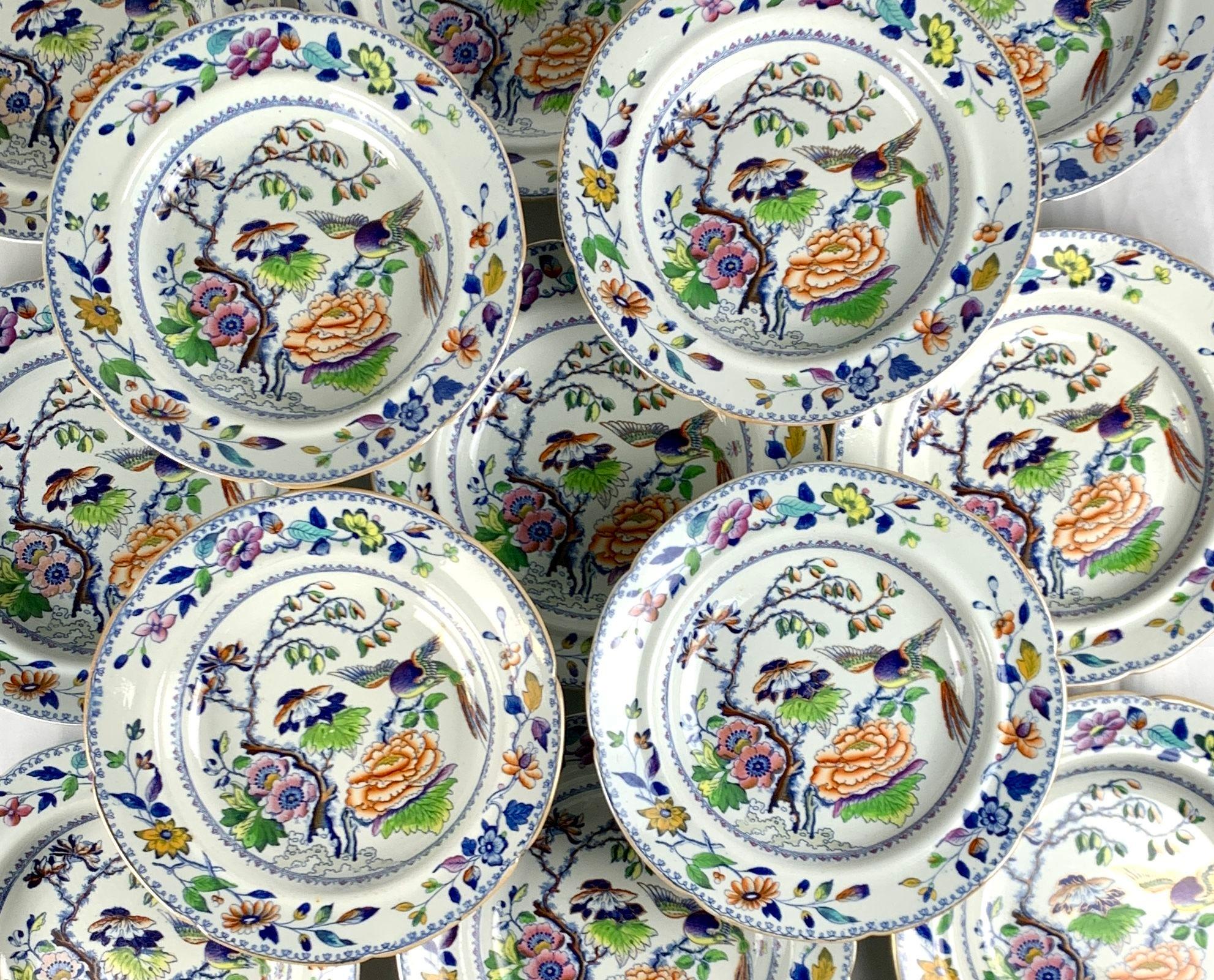 This set of fifteen Flying Bird soup or pasta dishes has everything you want in a colorful pattern: a beautiful bird and flowers painted rainbow colors.
The colors are an unexpected combination of purple, pink, yellow, orange, deep cobalt blue, and