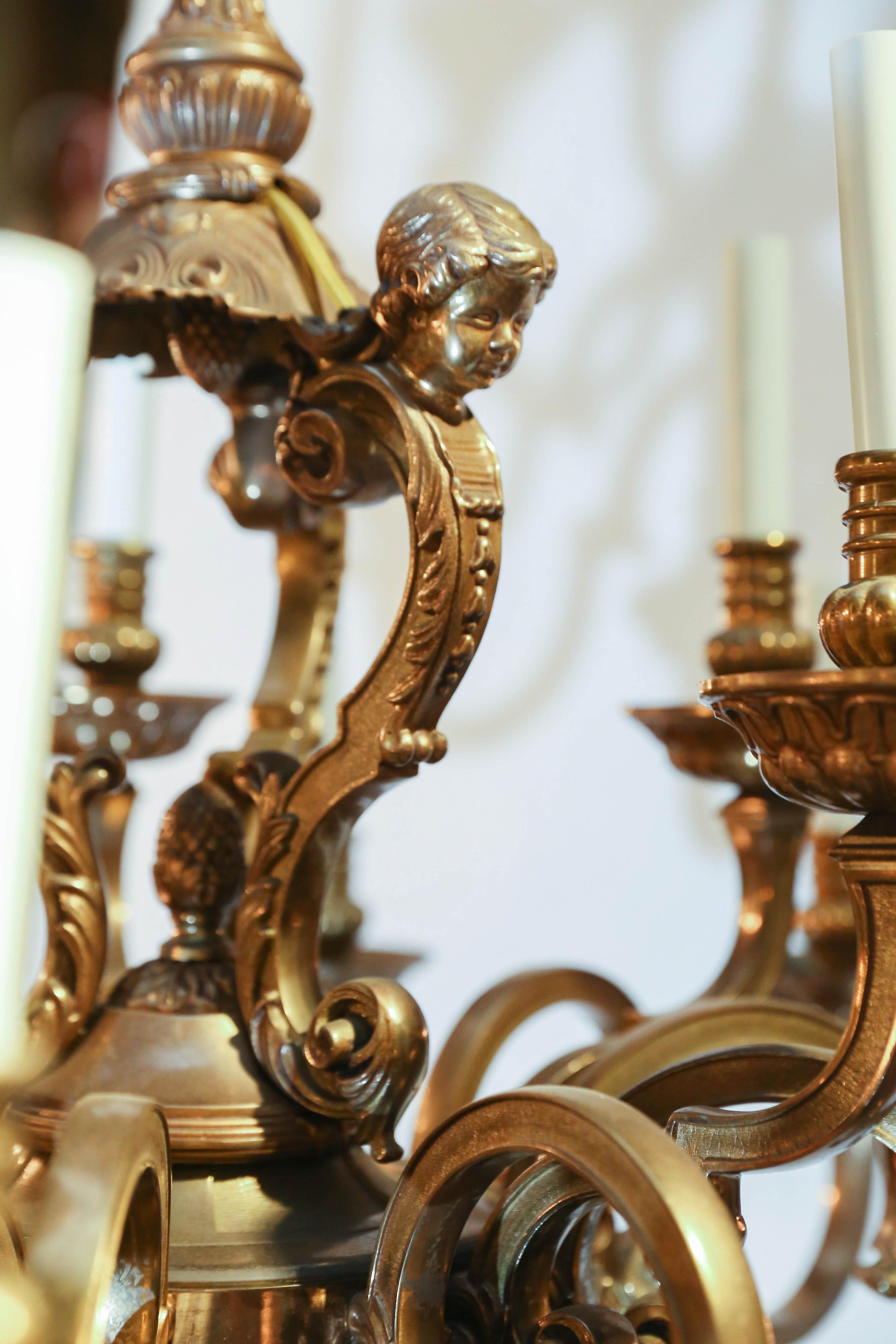 Cast Fifteen-Light Neoclassical Bronze Chandelier with an Antique Gold Finish For Sale