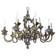 Fifteen-Light Neoclassical Bronze Chandelier with an Antique Gold Finish