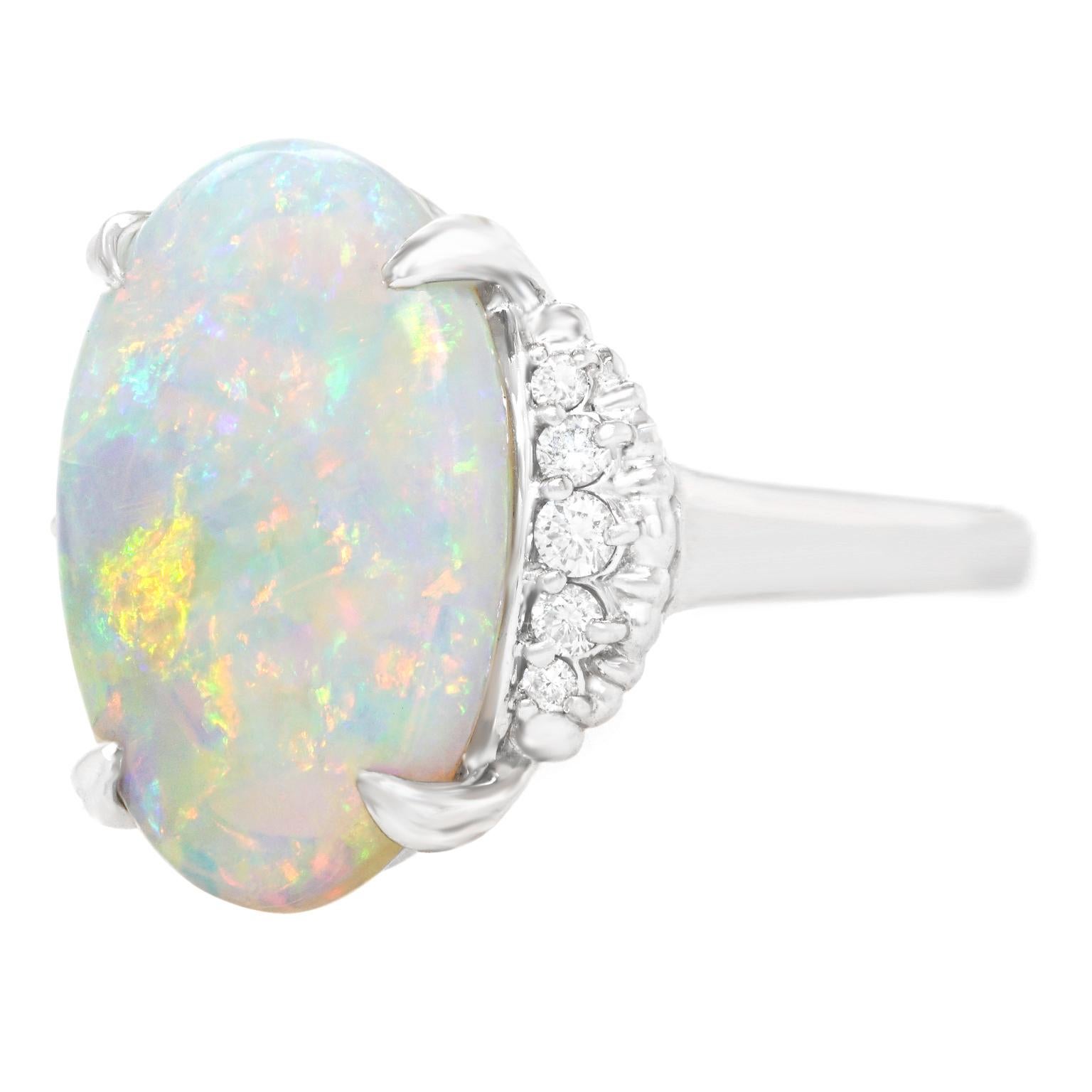 Cabochon 1950s 6.74 Carat Opal and Diamond-Set Ring
