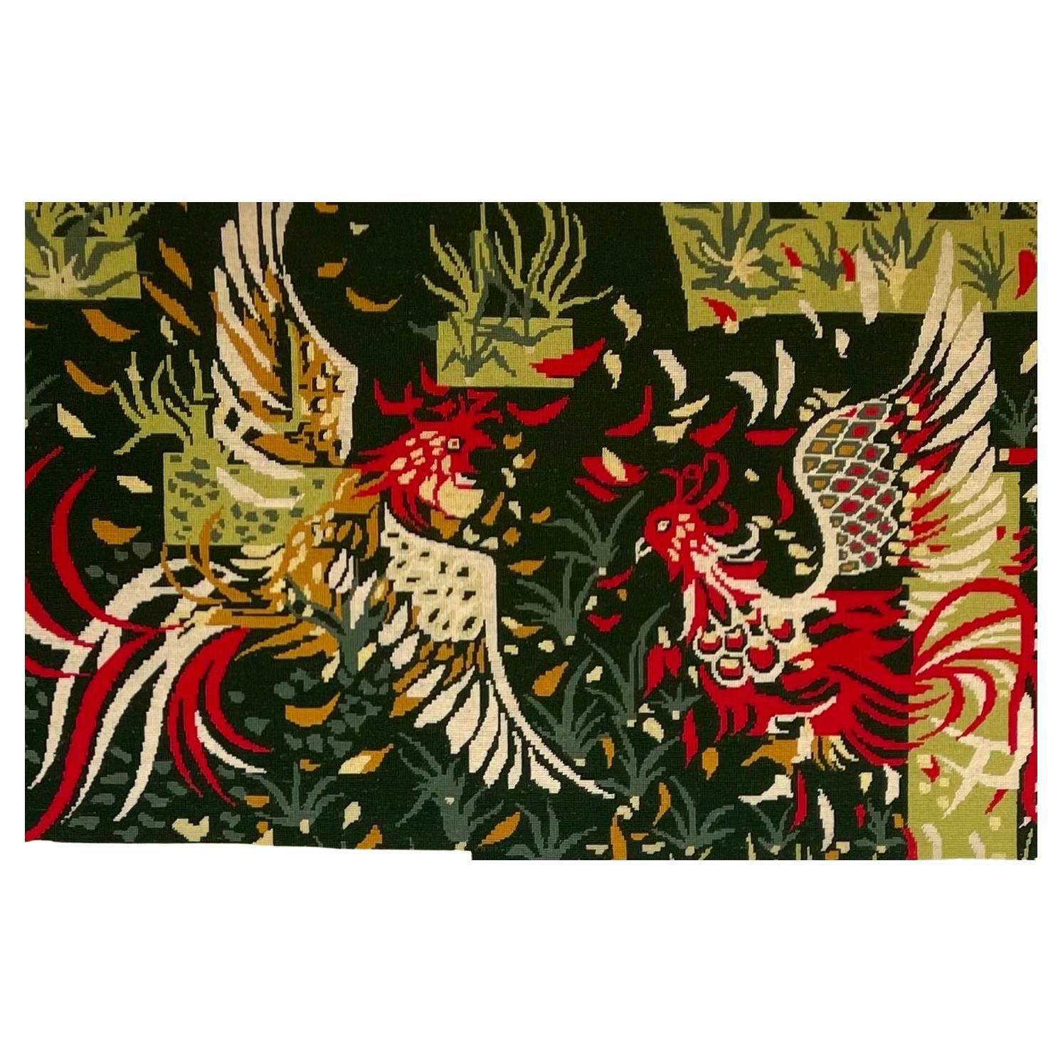 Fifties Aubusson large woven wool tapestry depicting fighting cockerels

In the style of Jean Lurcat

Circa 1950s

Height 83cm. Width 145cm. Depth 2cm

Aubusson tapestries were manufactured in central France at Aubusson and the nearby town of