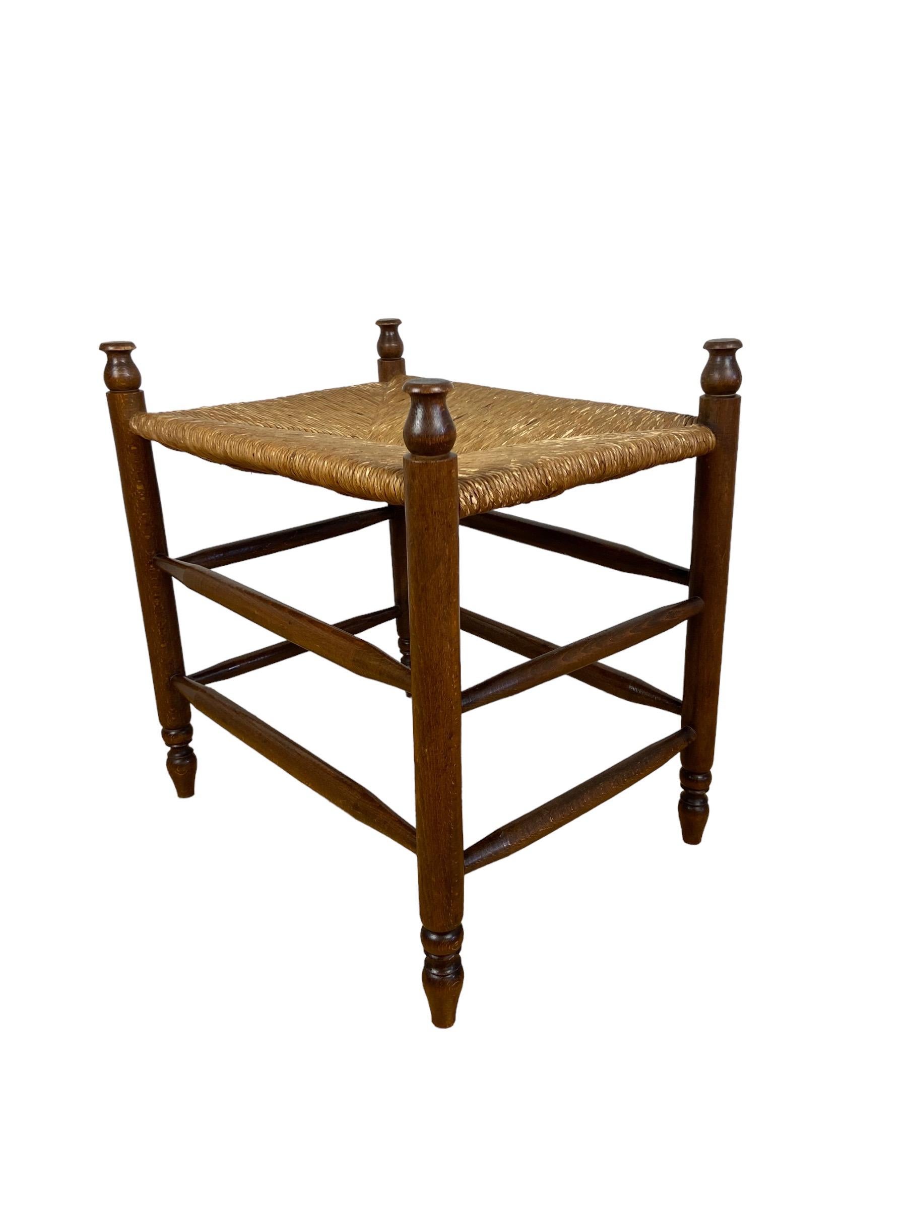 Stool made in The Netherlands in the fifties with a wicker seat.

Seating height 49 width 55 depth 40.